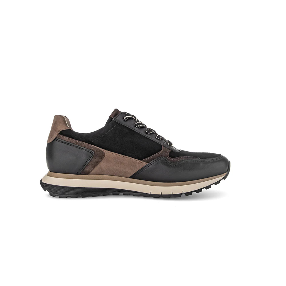 Brown and black sneaker on a white background