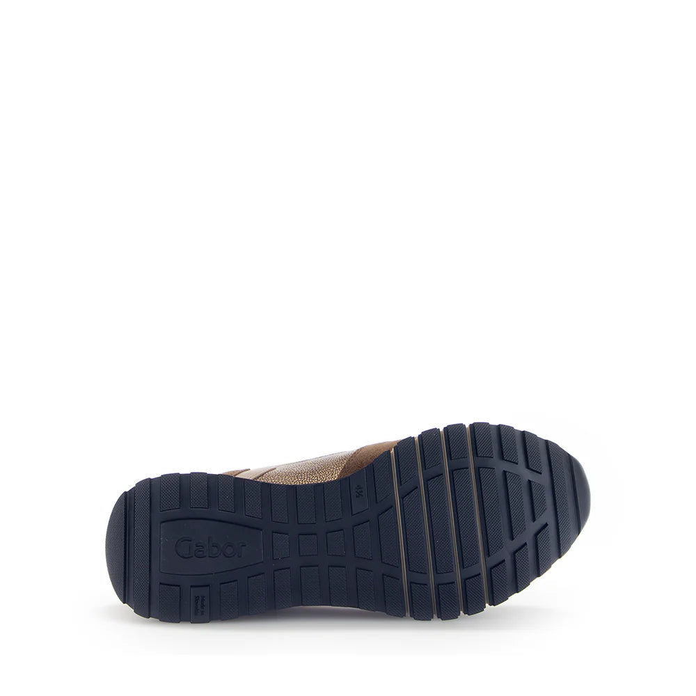 Navy blue sole of a shoe on a white background