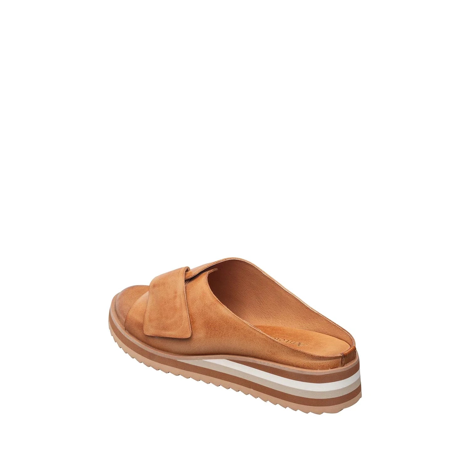 Brown sandal with a white sole on a white background