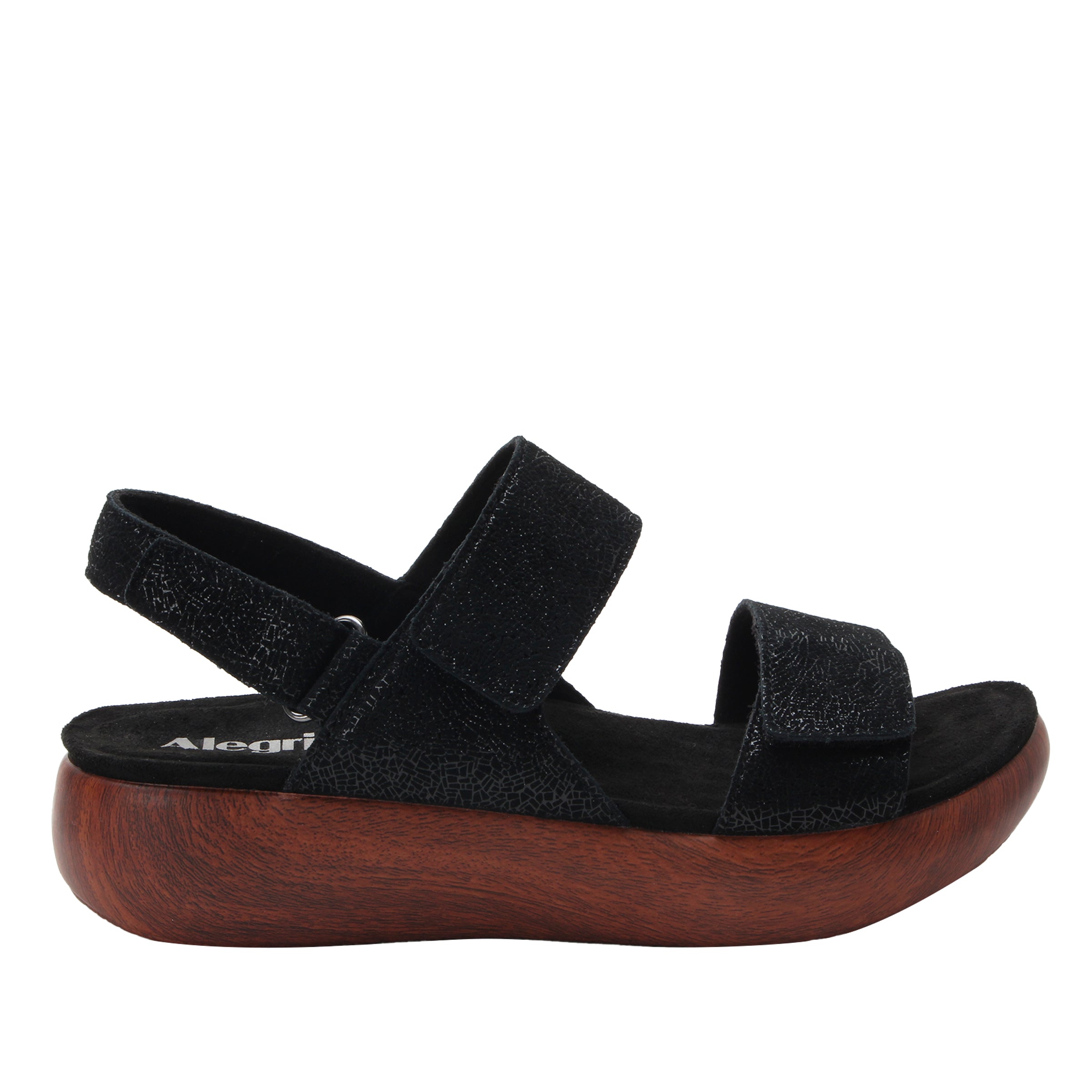 Black sandal with wooden sole on a white background