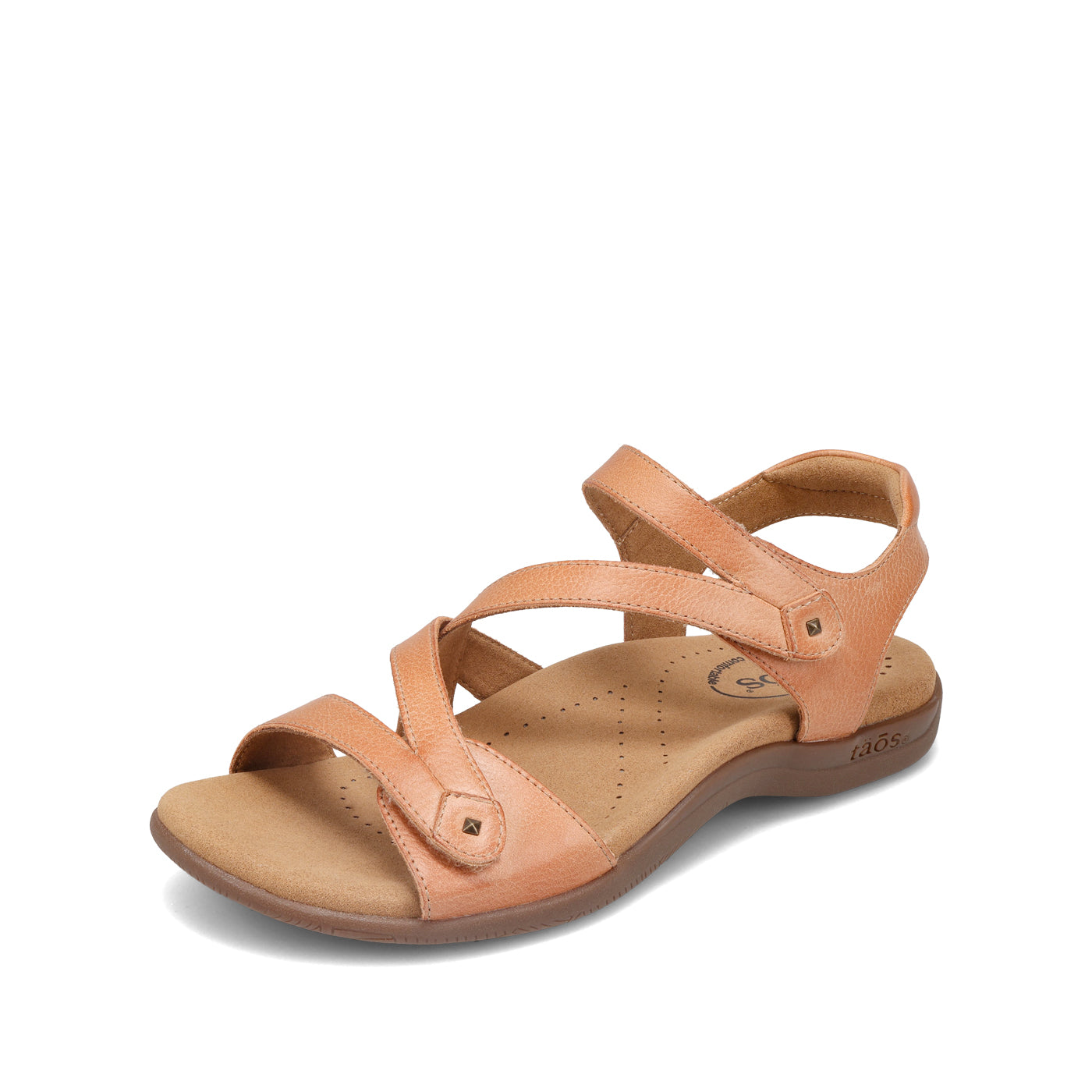 Peach-colored sandal on a white background