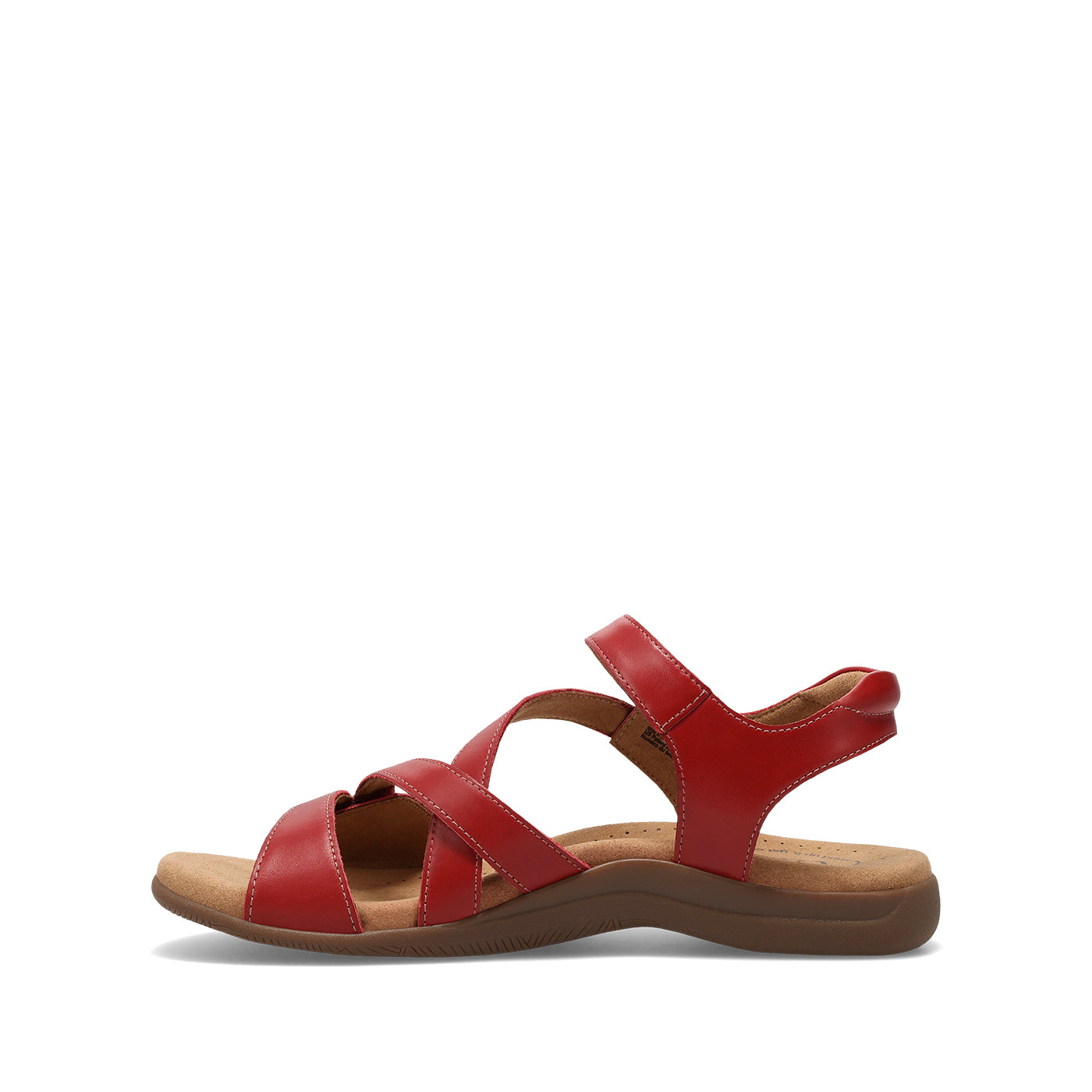 Red sandal with a brown sole on a white background