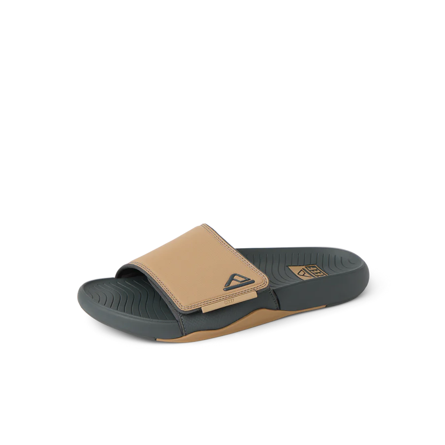 Tan and black sandal on a white background