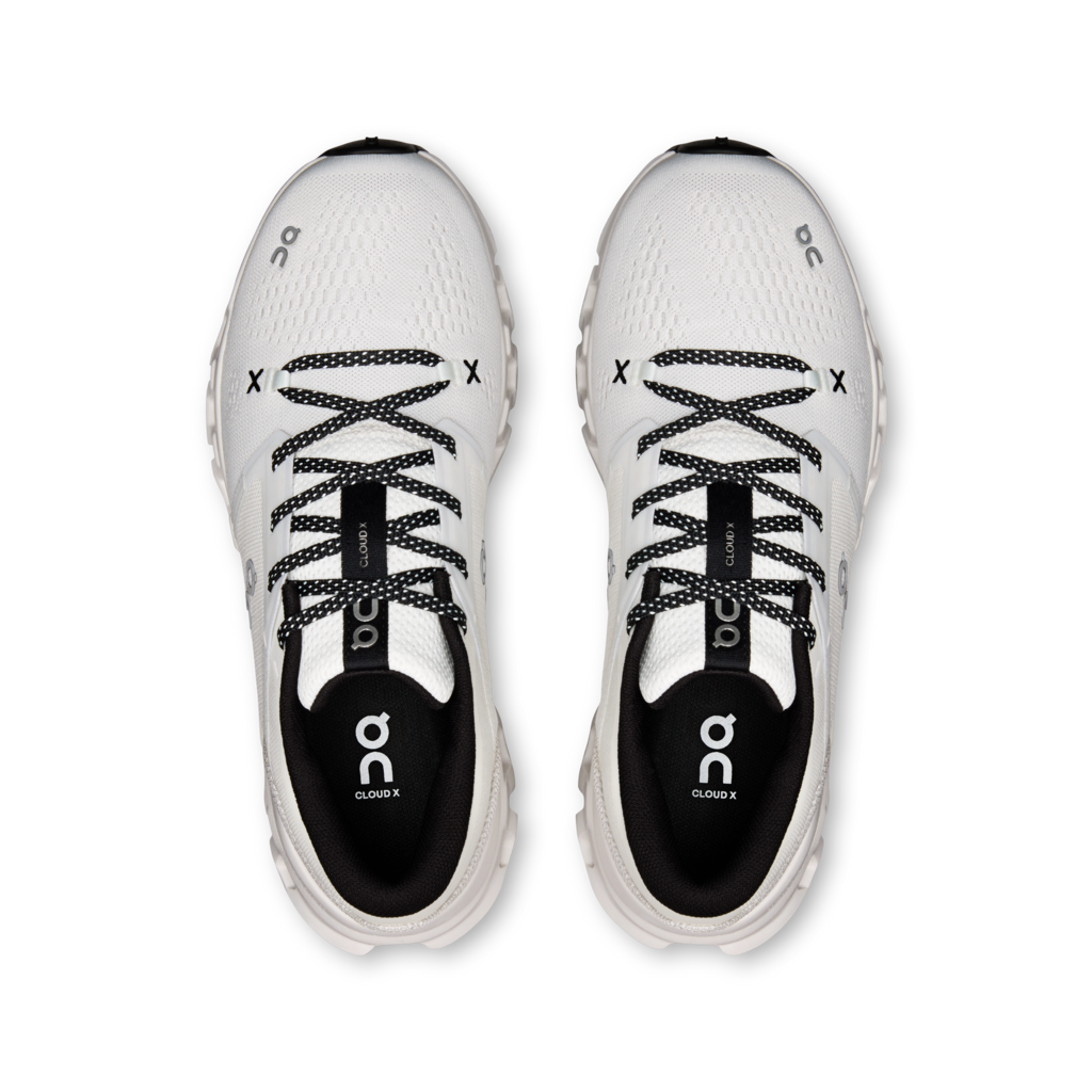 White running shoes with black accents on a white background
