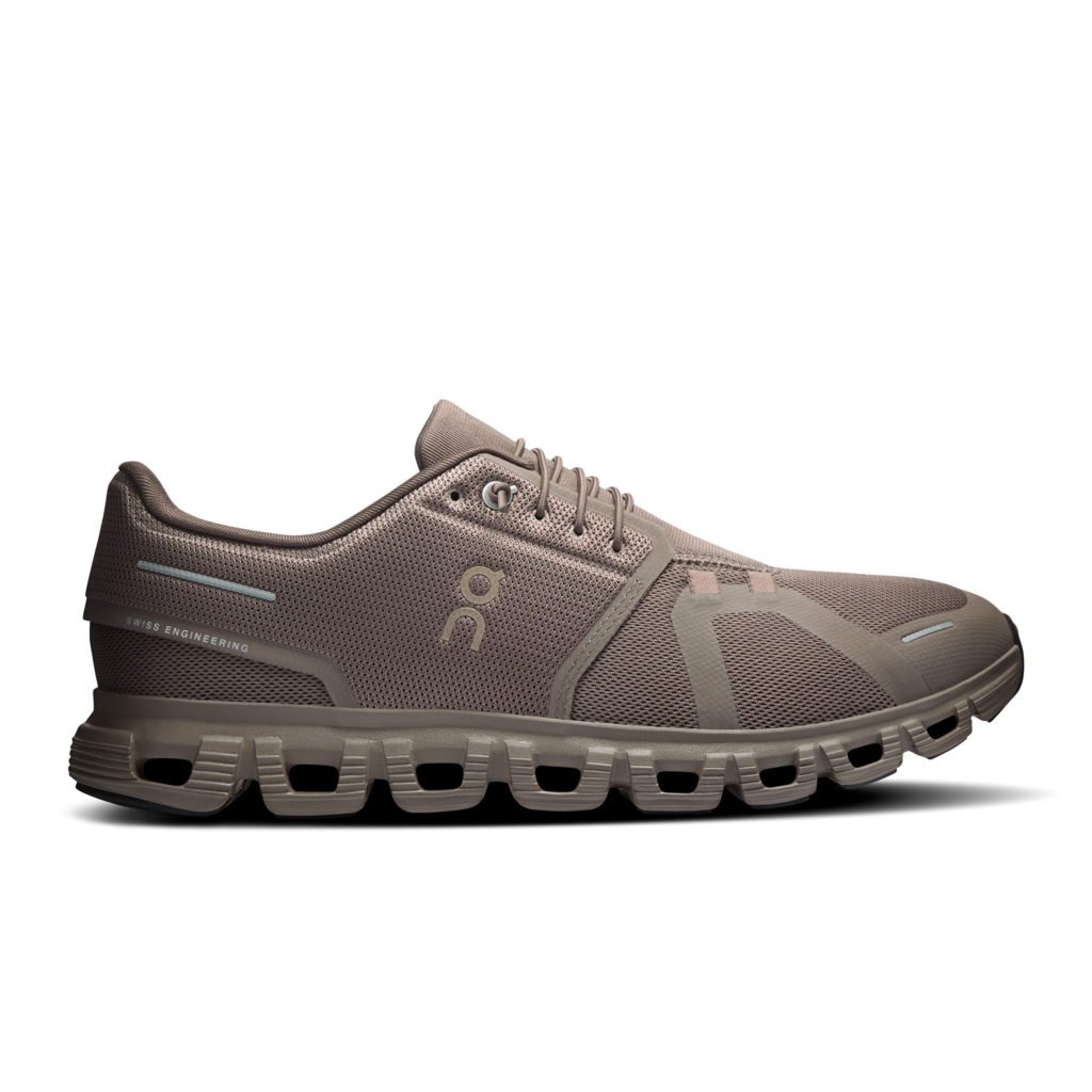 Brown running shoe with unique sole design on a white background
