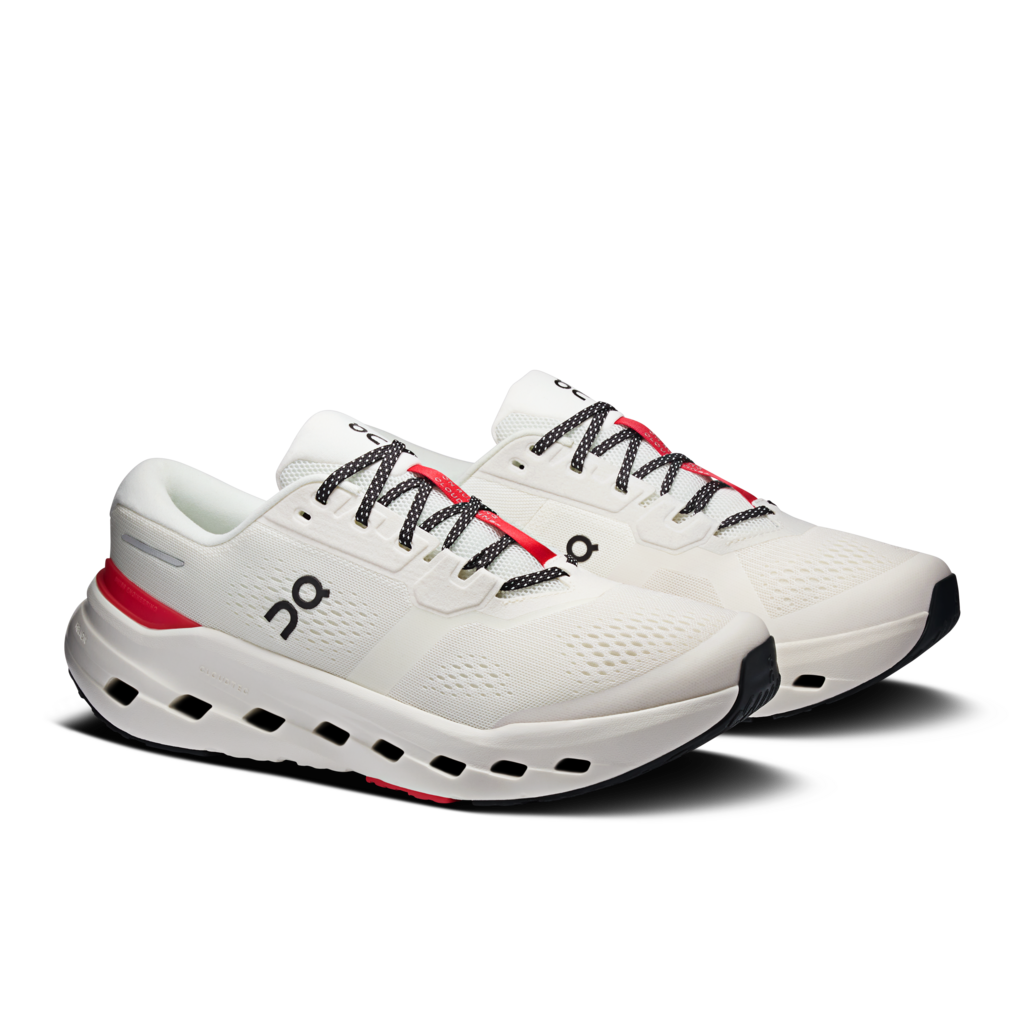 White running shoe with red accents on a white background