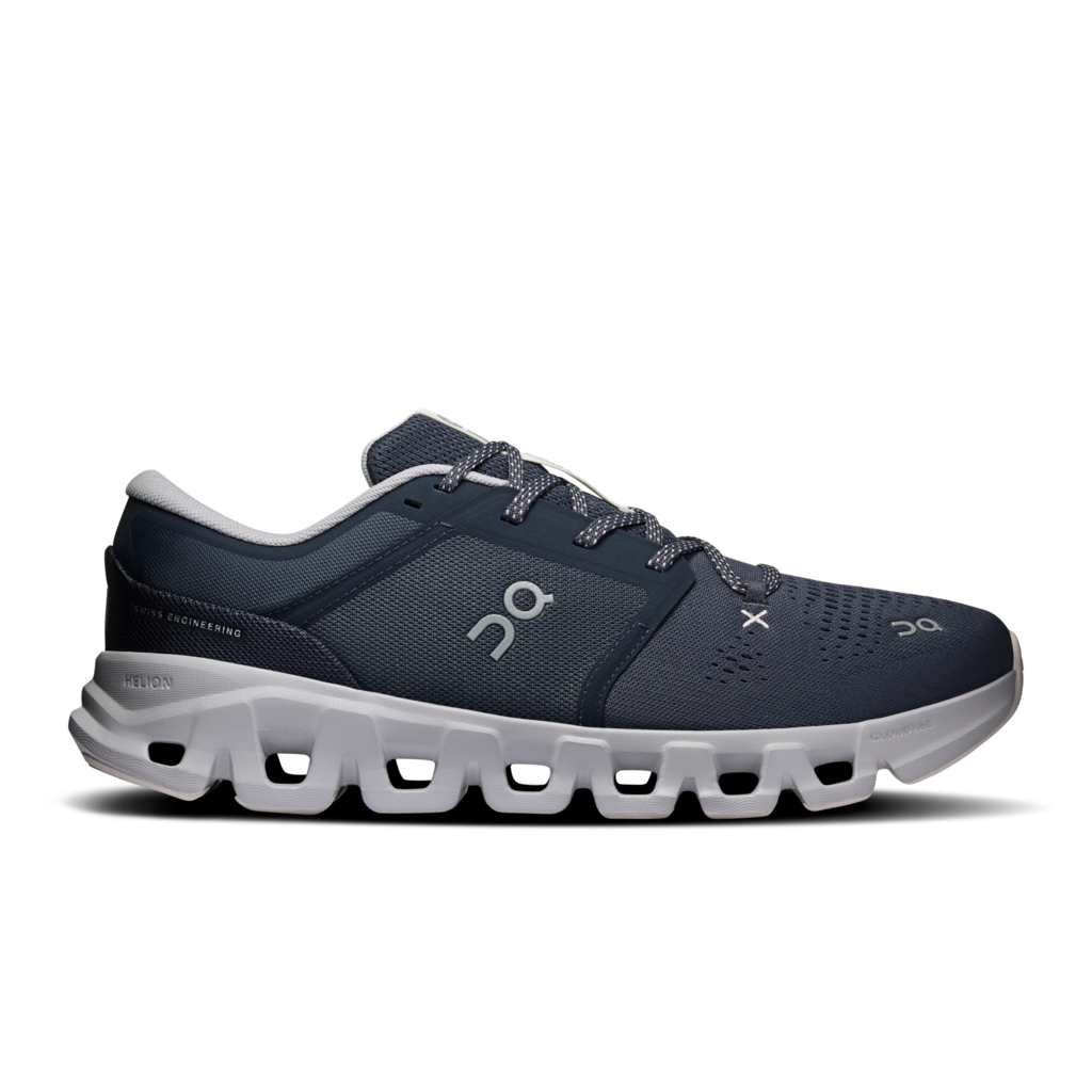 A single On Cloudrunner sneaker in navy blue and light gray, shown from a side profile view against a plain white background.