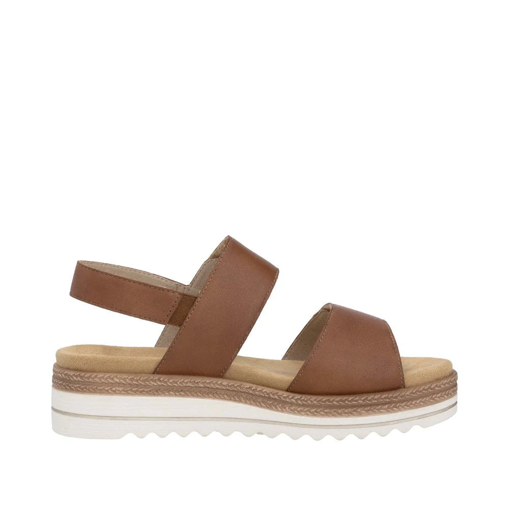 Brown sandal with a white sole on a white background