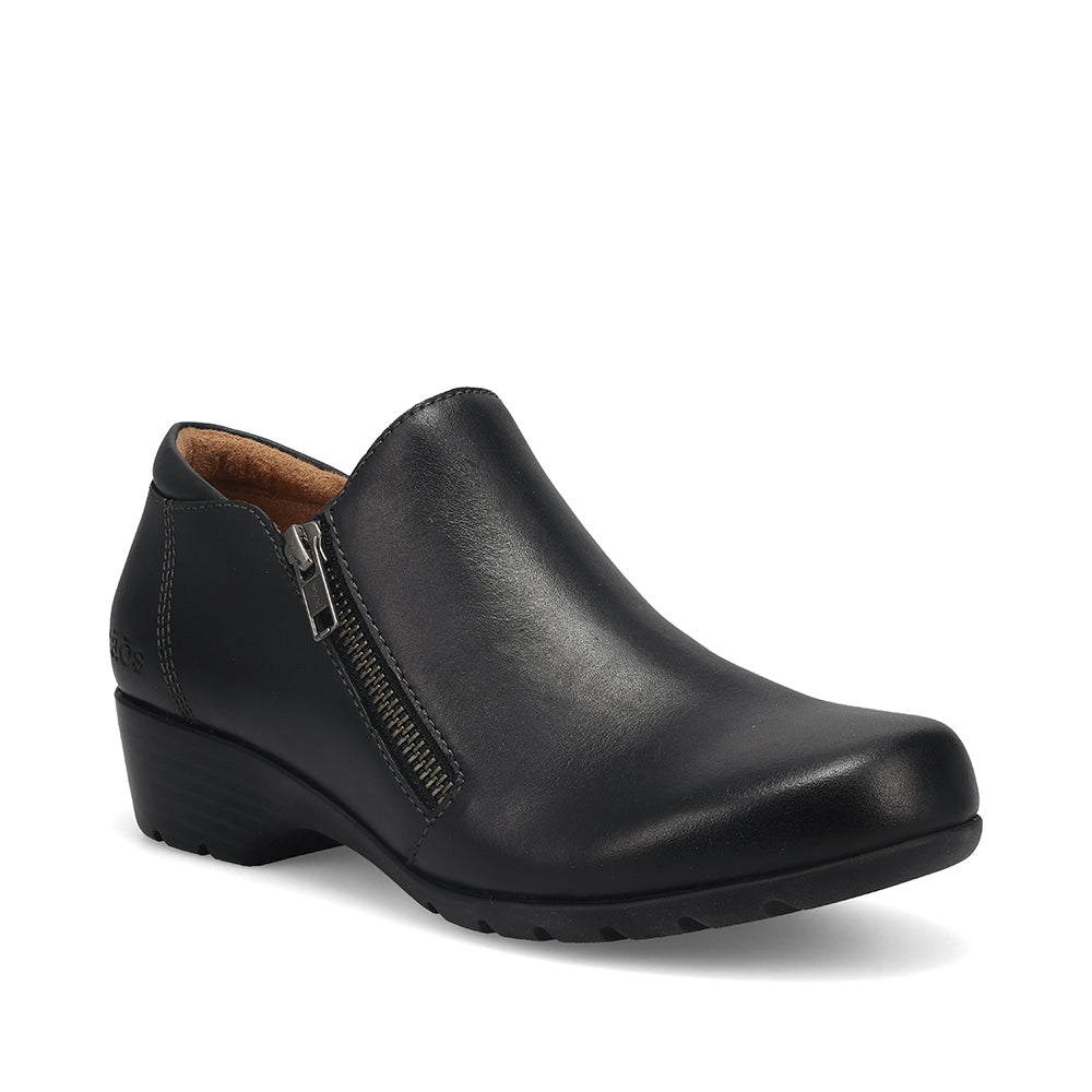 Black leather shoe with a zipper on a white background