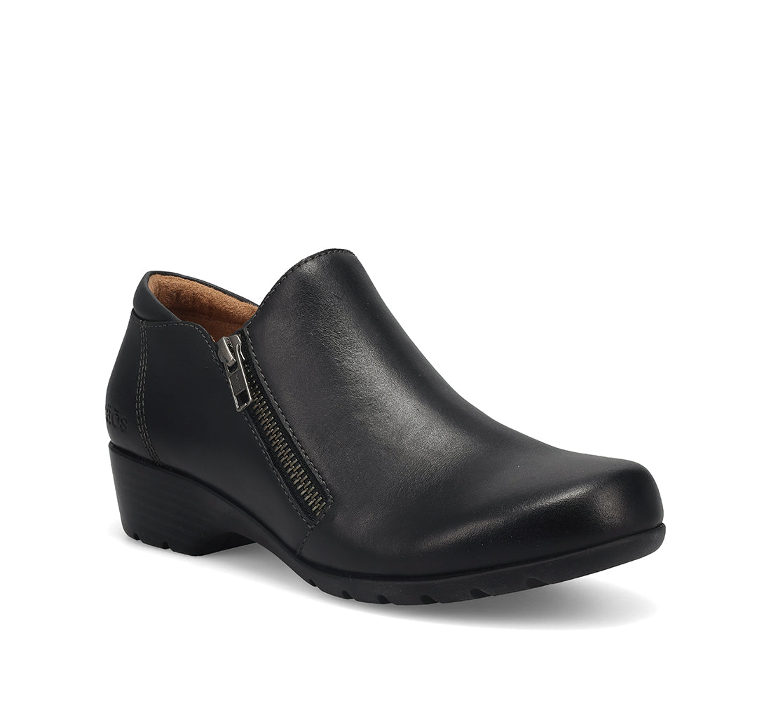 Black leather shoe with a zipper on a white background