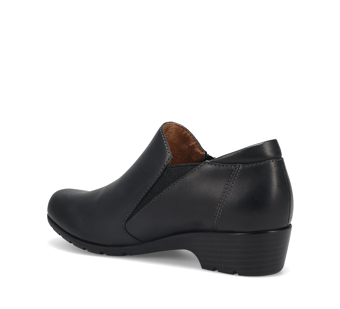 Black leather shoe on a white background