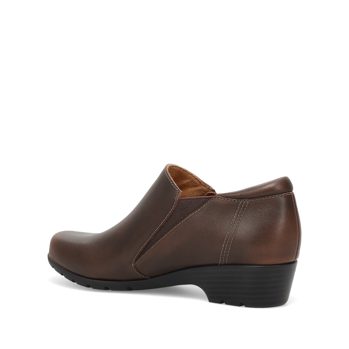 A dark brown leather slip-on wedge shoe with a black sole and heel, shown from a side-rear angle on a white background.