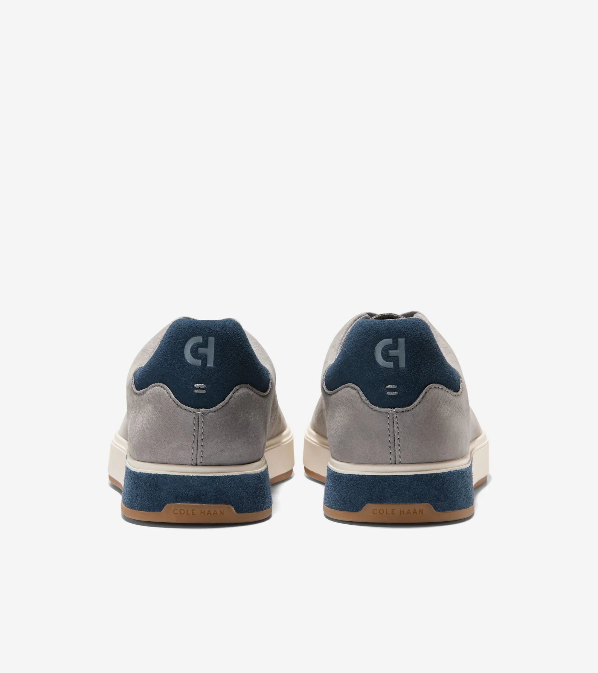 Gray and blue sneakers with a brand logo on a white background