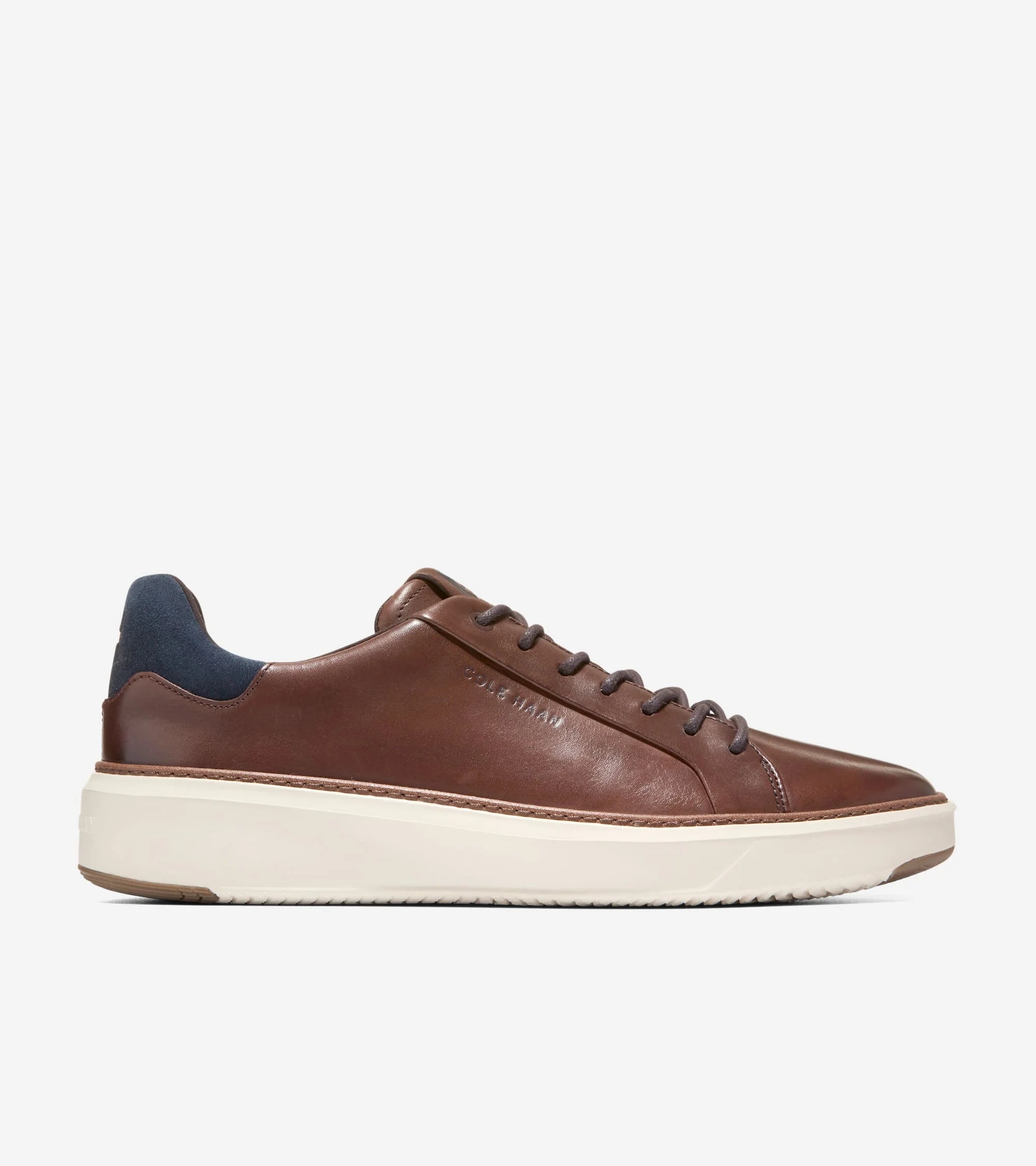 Brown leather sneaker on a white background
