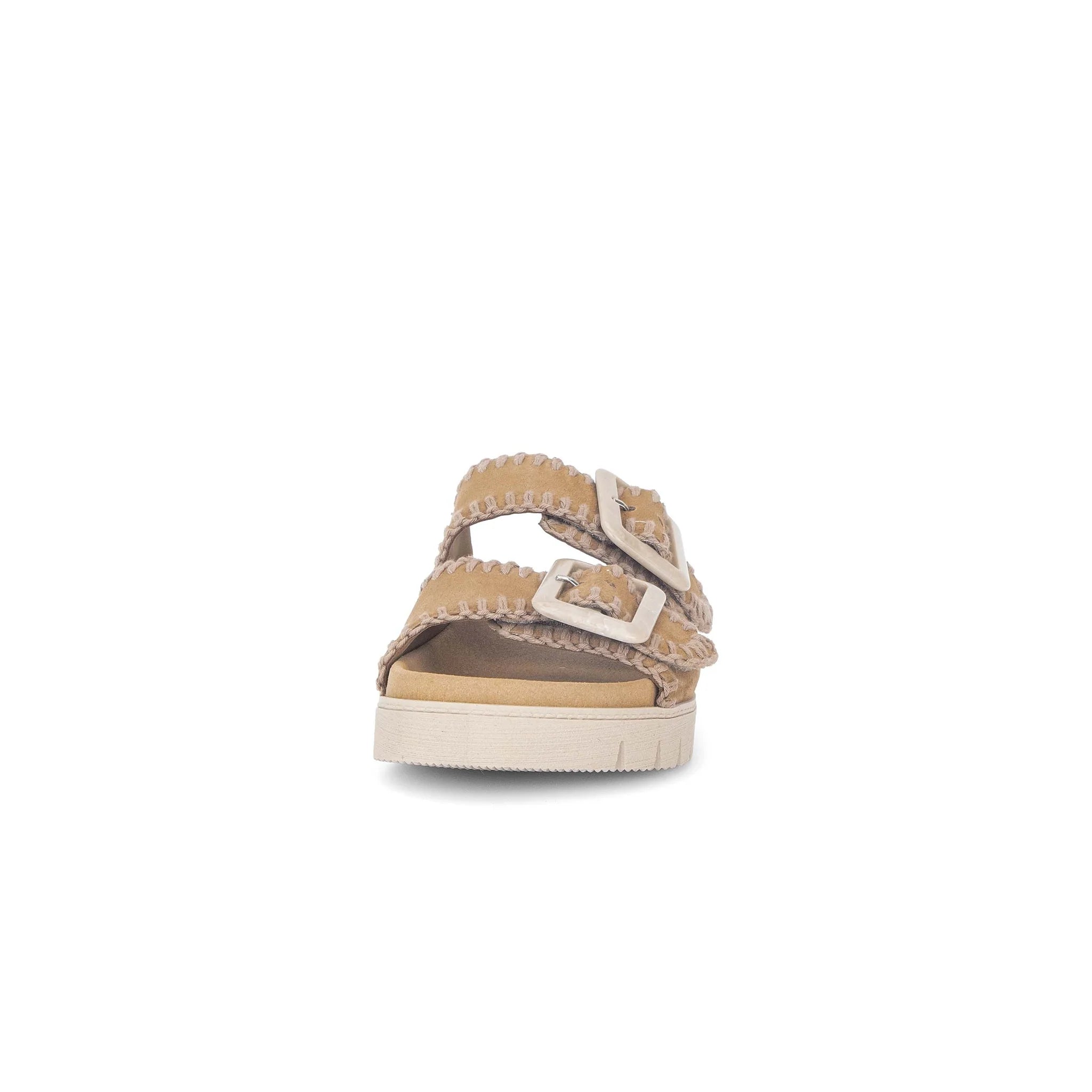 Beige sandal with a buckle on a white background