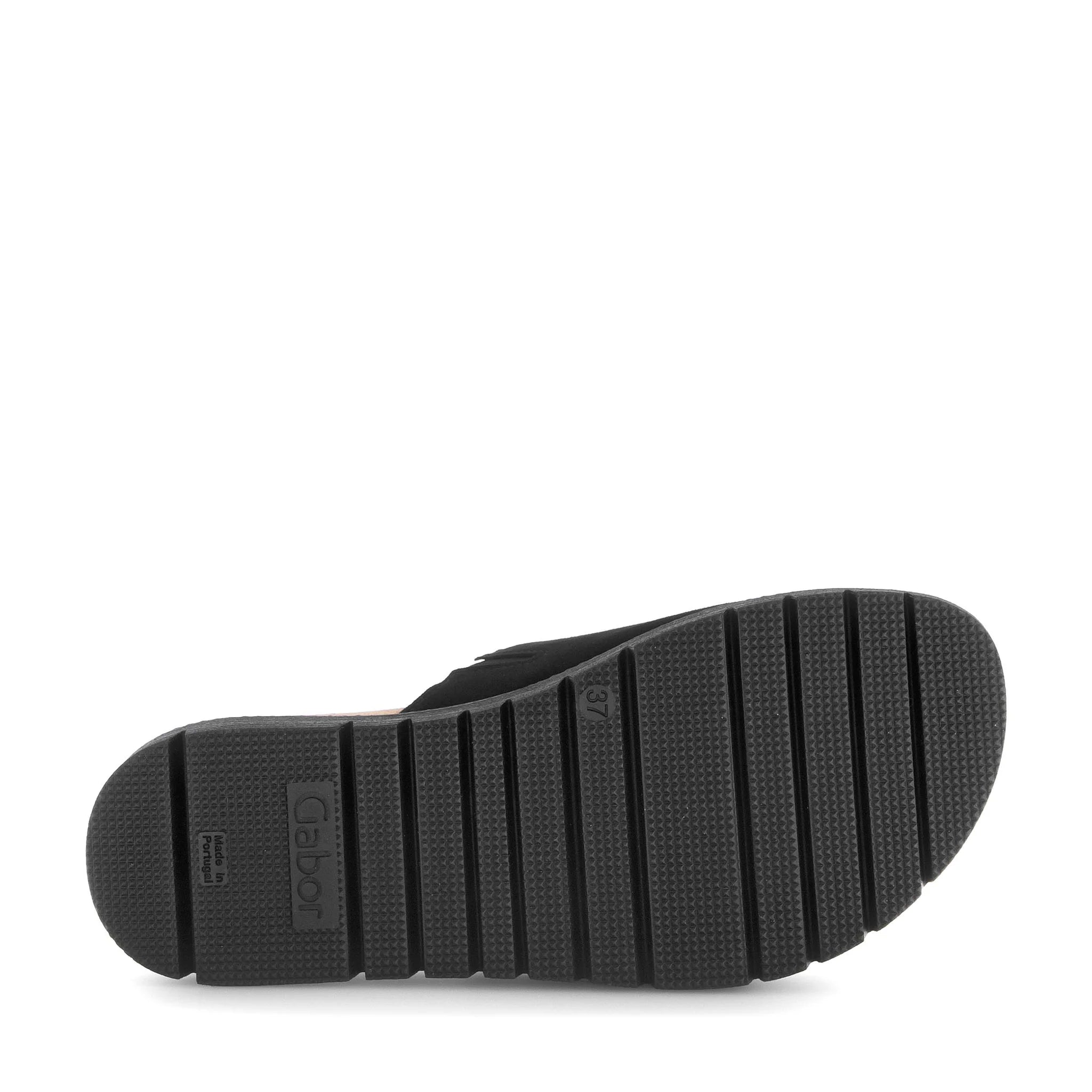 Black shoe sole with brand logo on a white background
