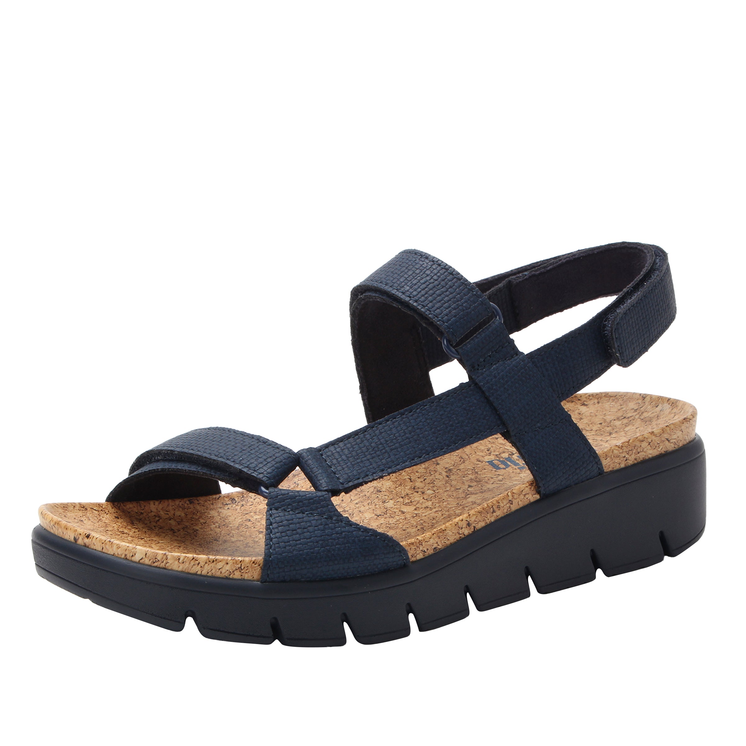 Navy sandal with cork insole on a white background