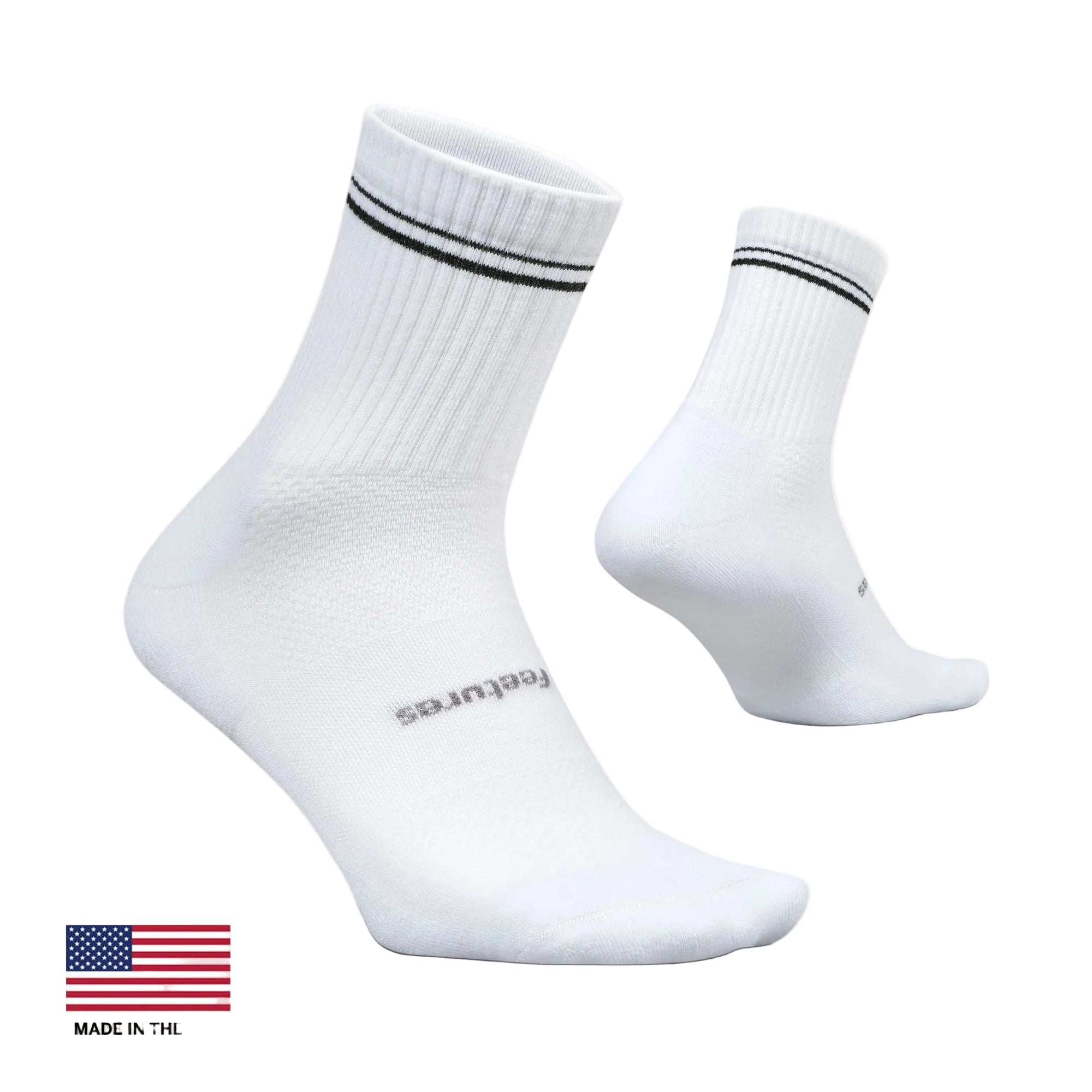 White socks with black stripes on a light gray background, featuring the brand Feetures