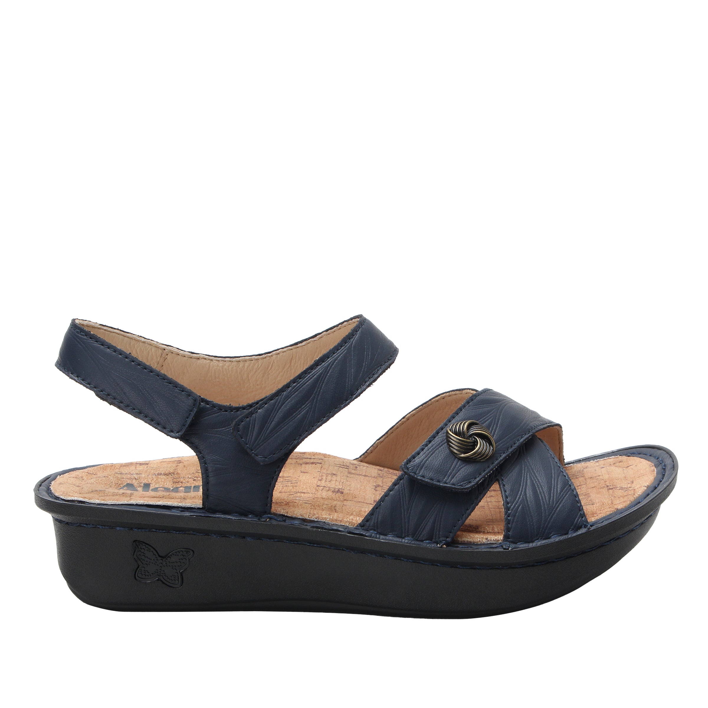 Navy blue sandal with a black sole on a white background