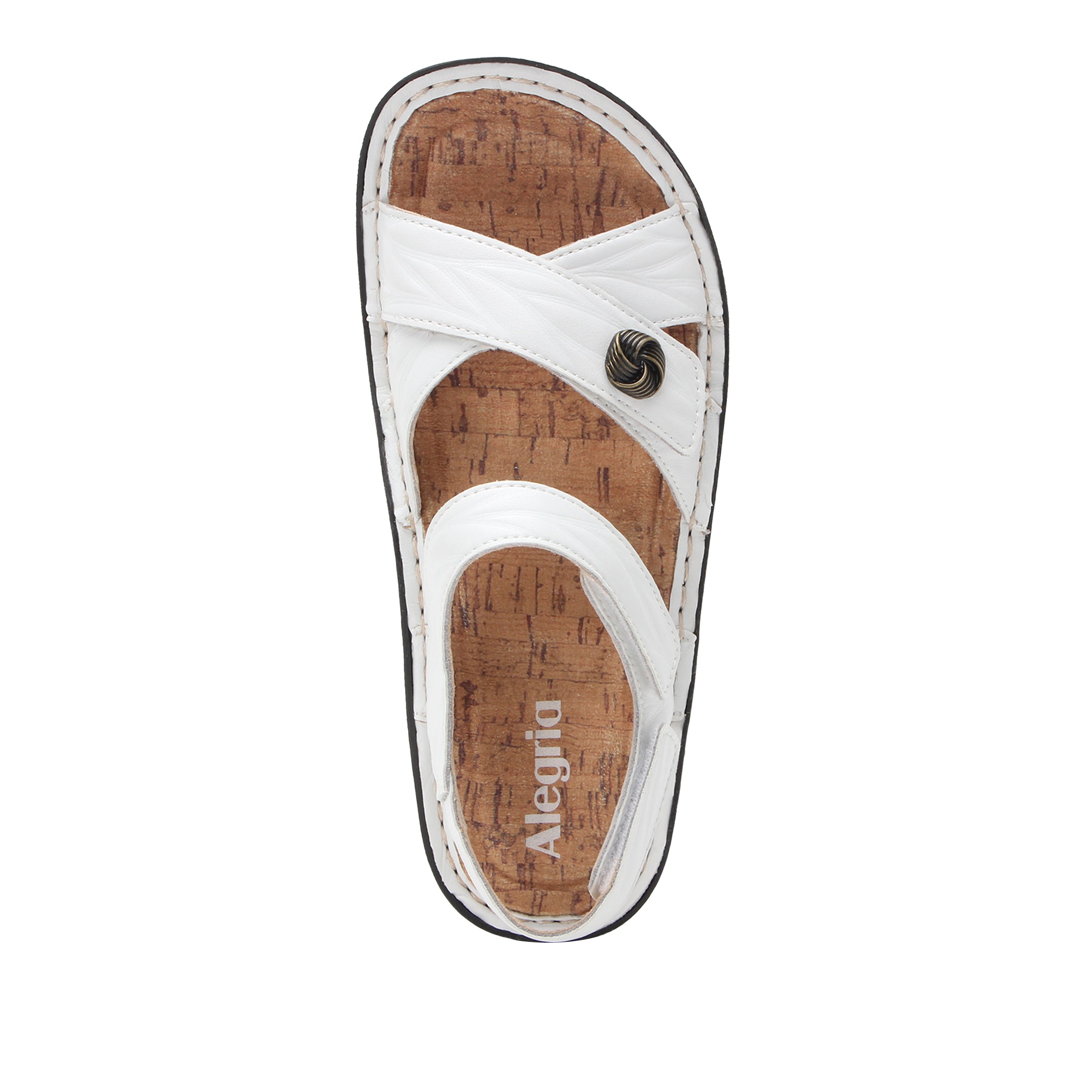 White sandal with cork sole on a white background