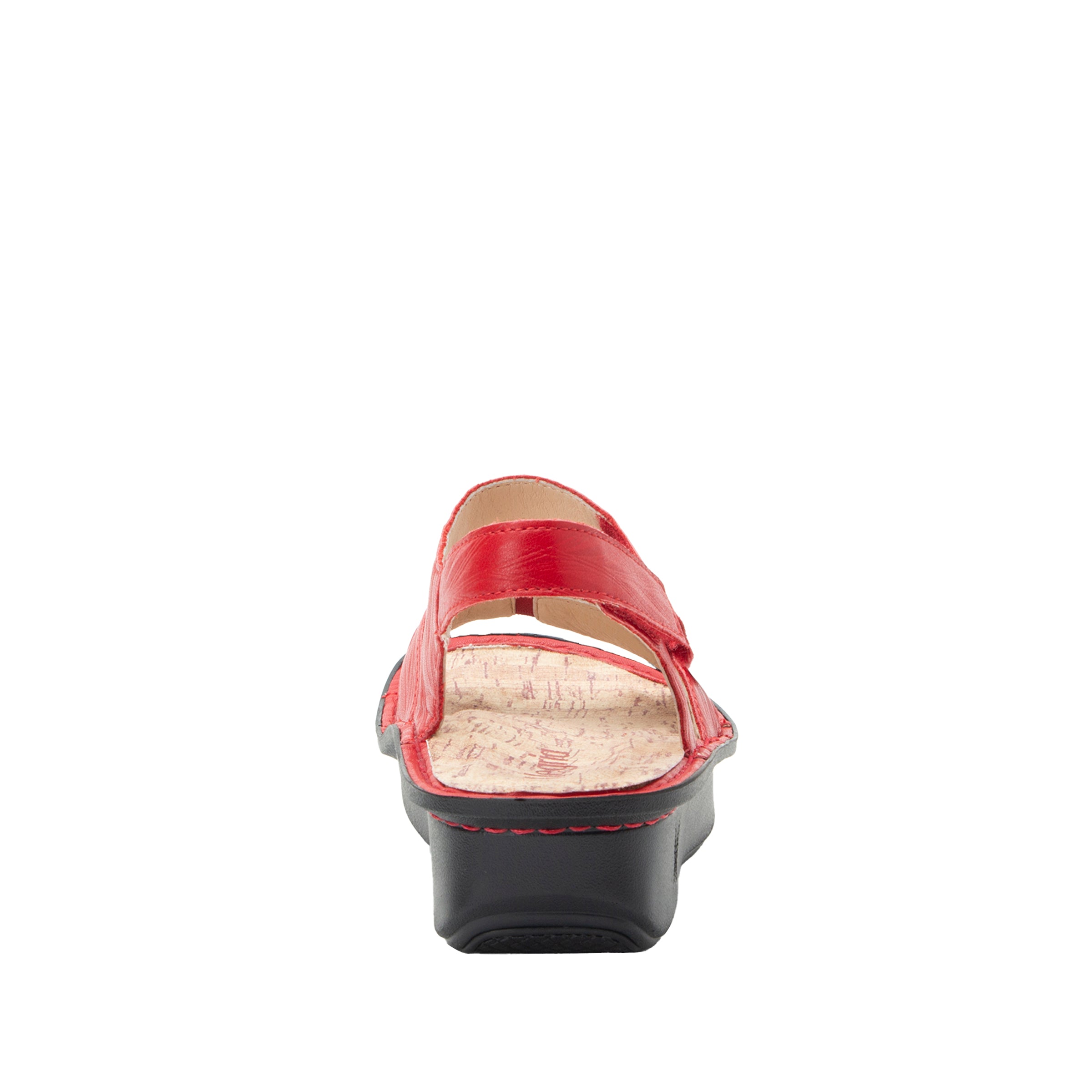 Red sandal with a black sole on a white background