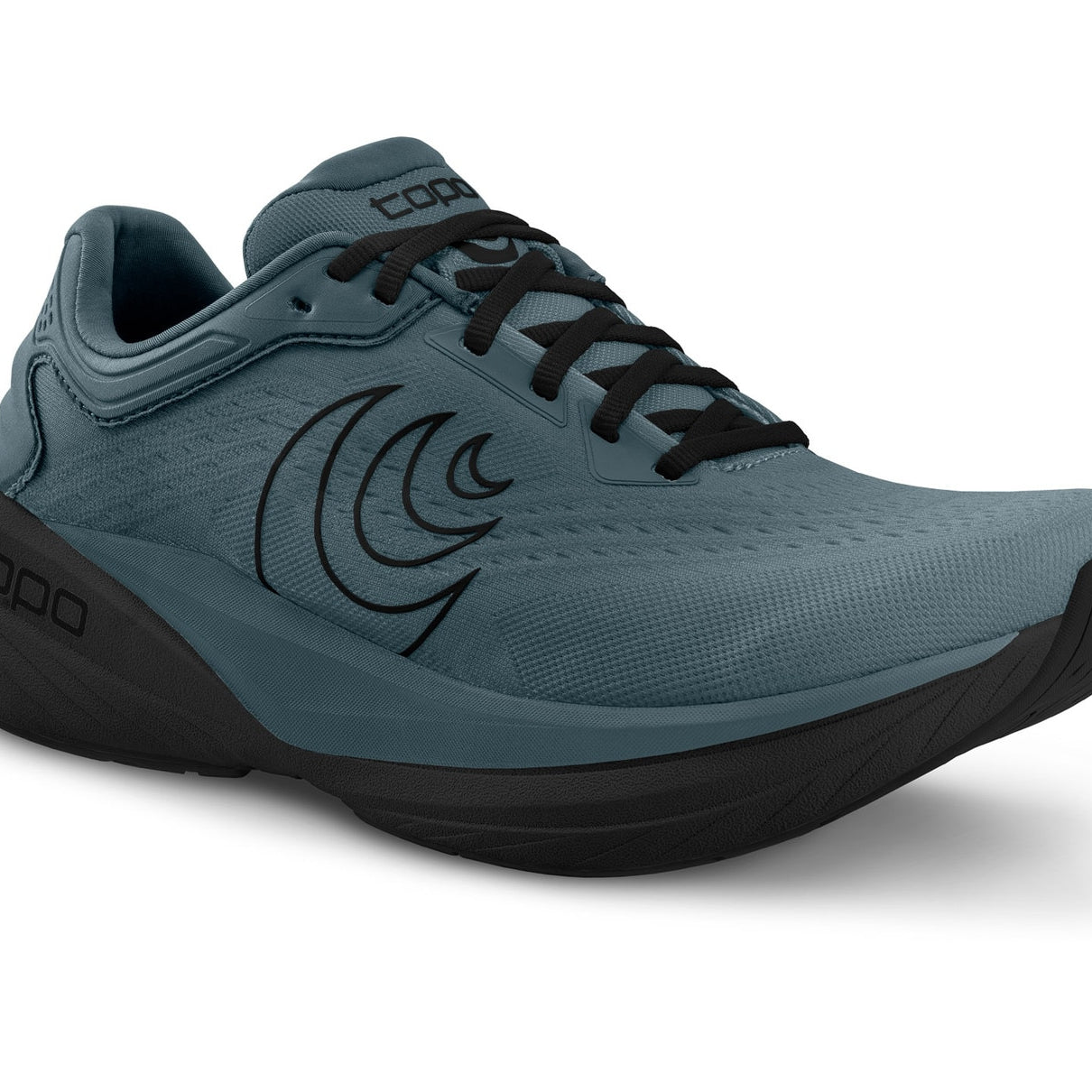 Blue running shoe with black sole on a white background