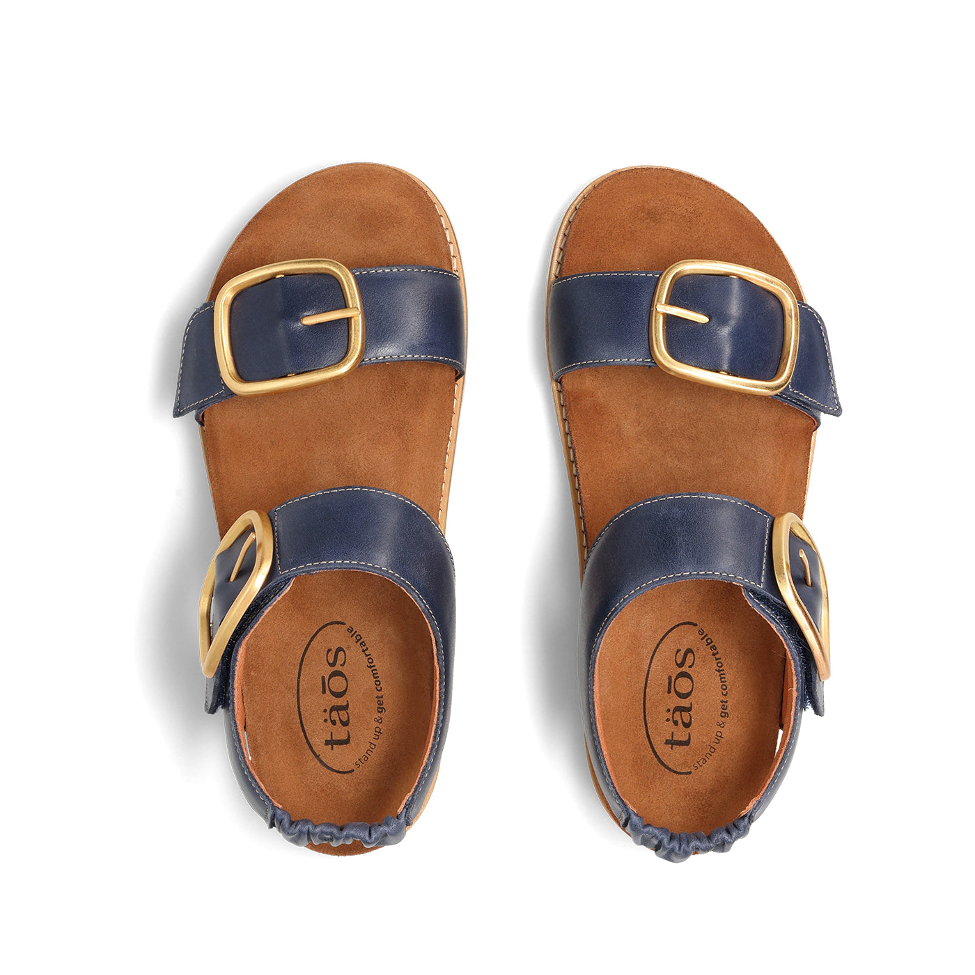 Pair of sandals with blue straps and gold buckles on a white background