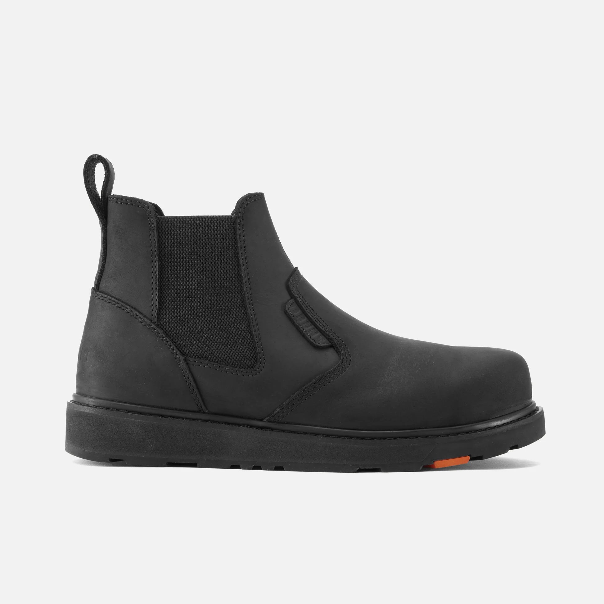 Black Chelsea boot on a light gray background