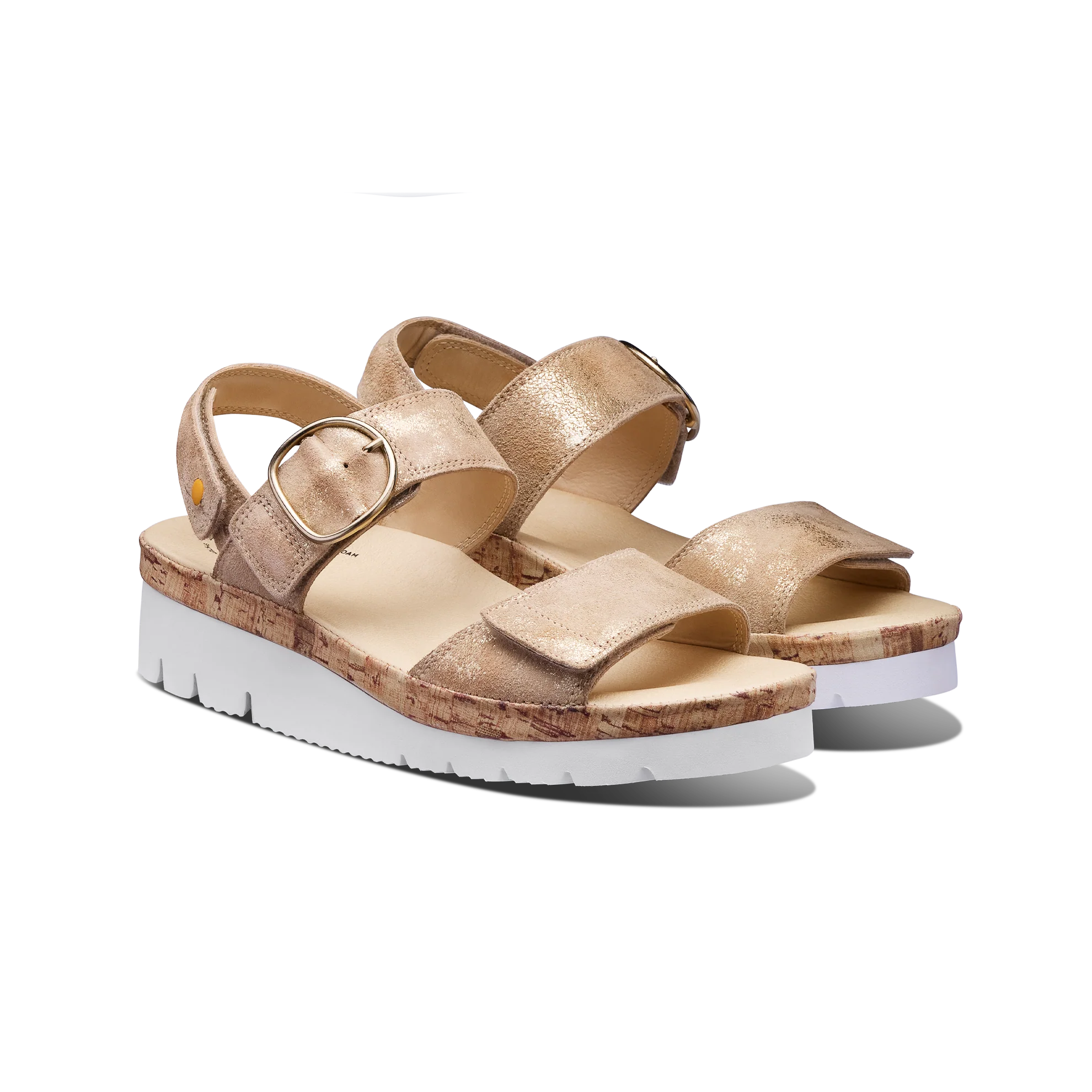 Pair of gold sandals with cork sole on a white background