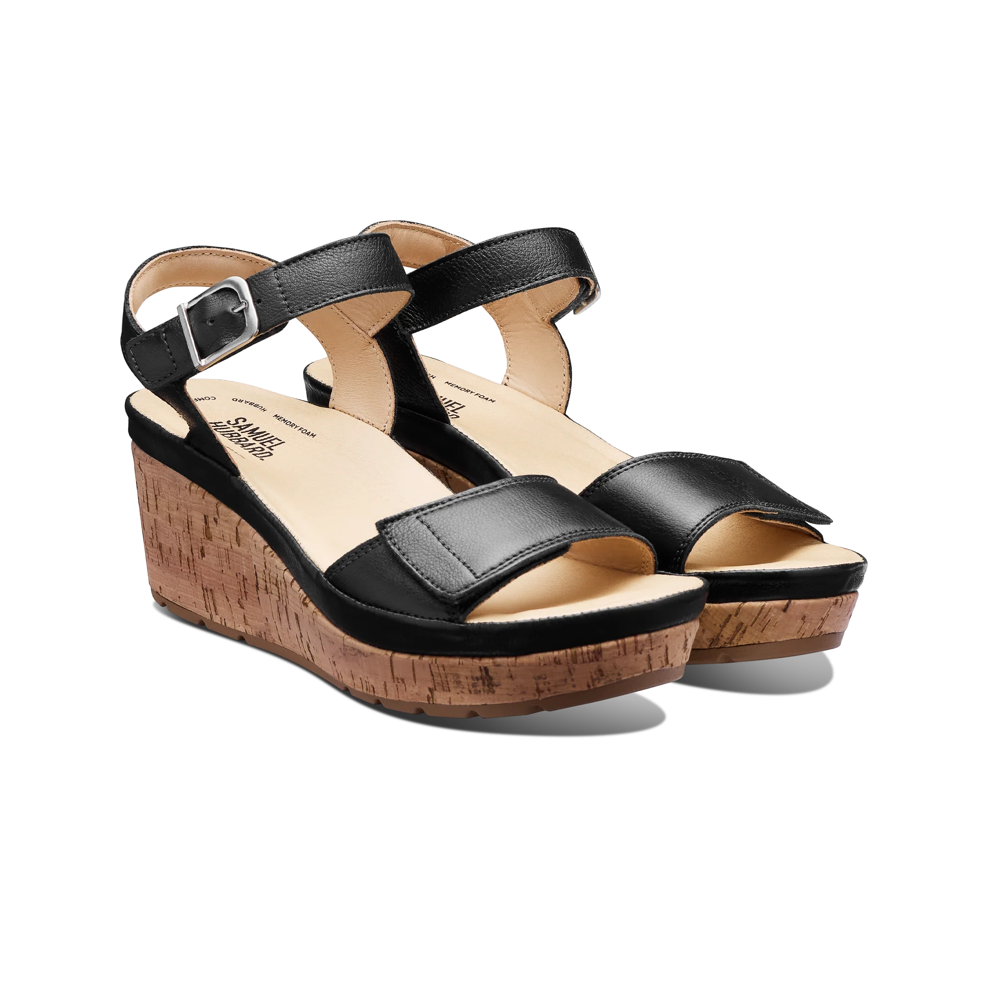 Black wedge sandals with cork sole on a white background
