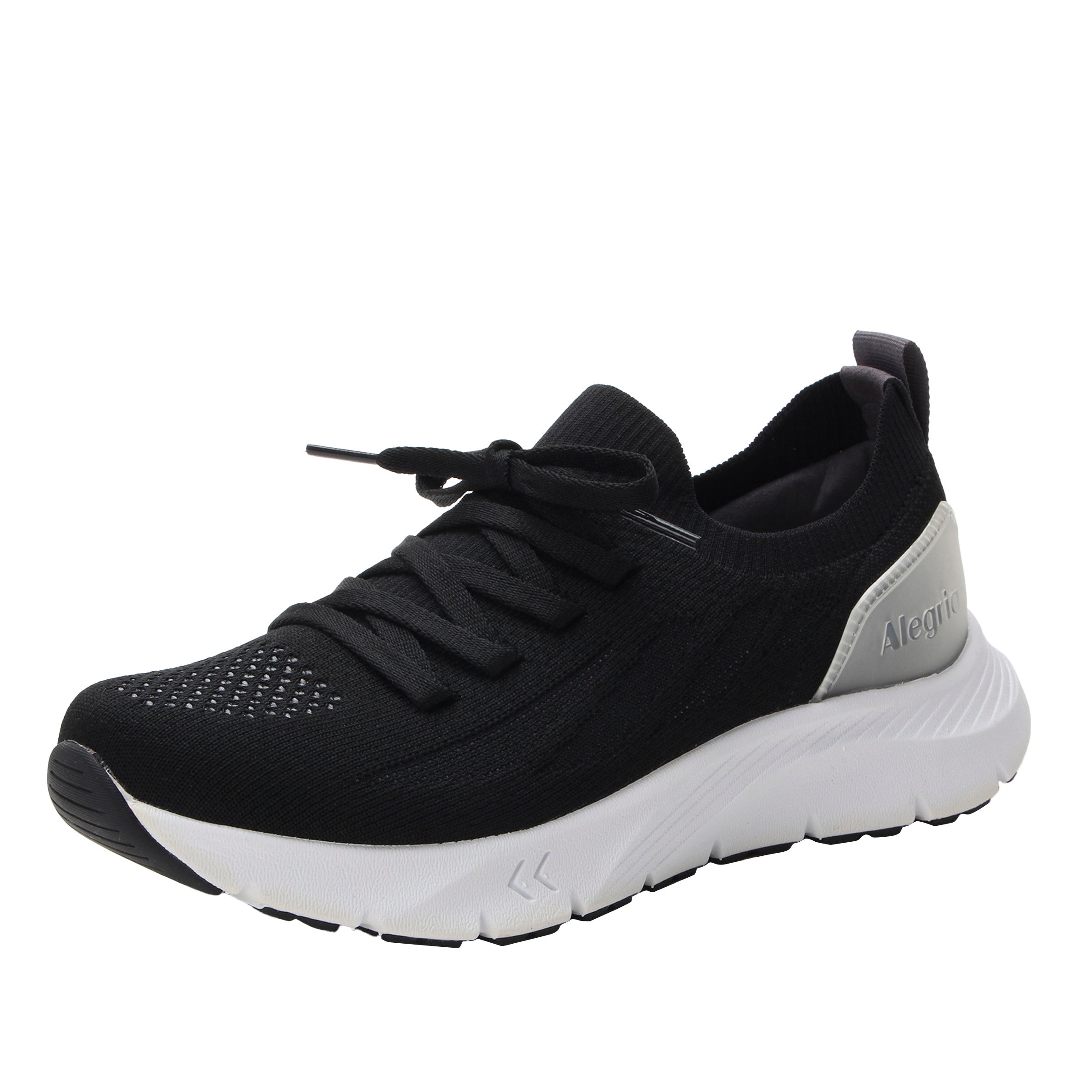 Black athletic shoe with white sole on a white background
