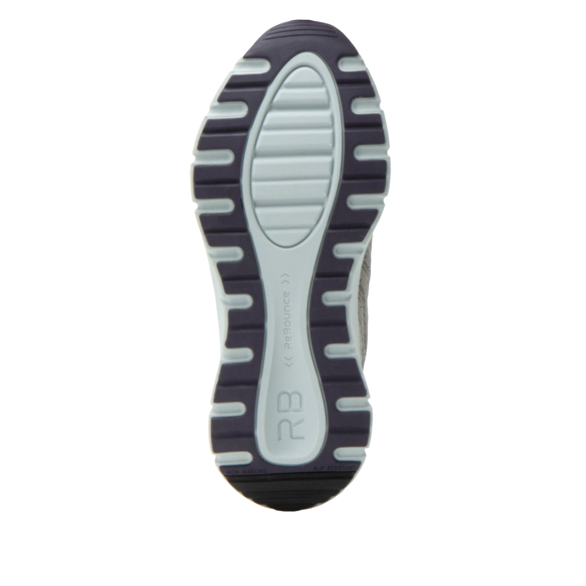Close-up of a shoe sole with 'RBI' branding on a white background