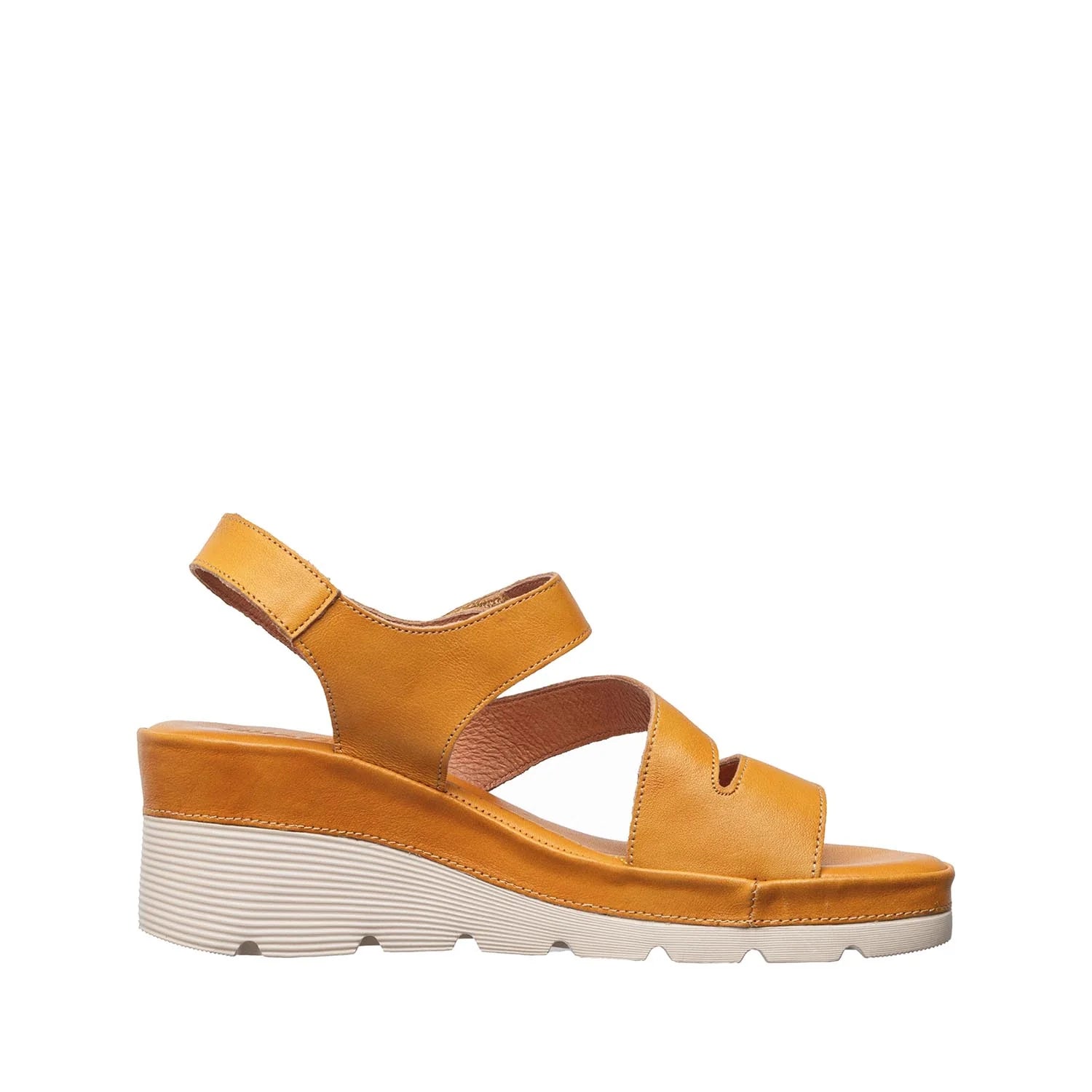 Yellow sandal with a thick sole on a white background