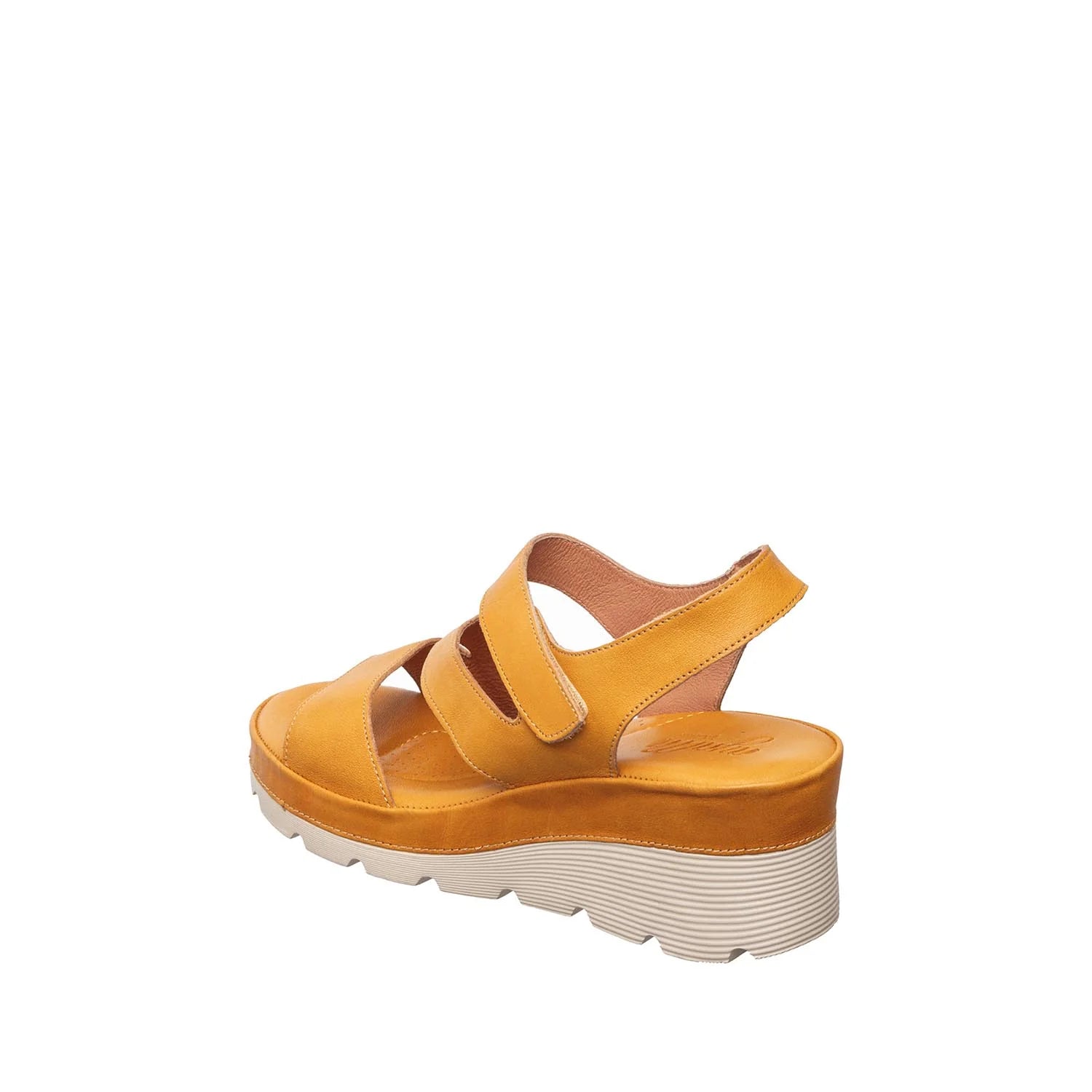 Yellow sandal with a platform sole on a white background