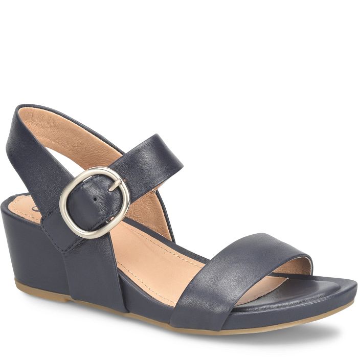 Navy wedge sandal with a gold buckle on a white background