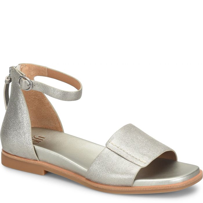 Silver sandal with a brown sole on a white background
