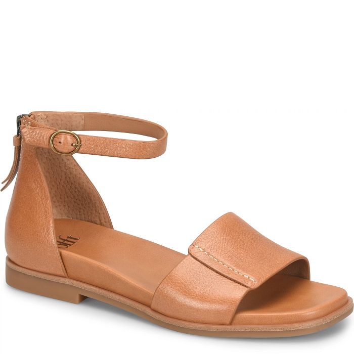 Tan sandal with a single strap on a white background
