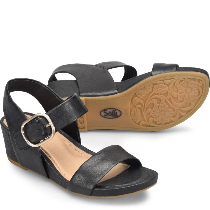 Black sandal with a strap and buckle on a white background