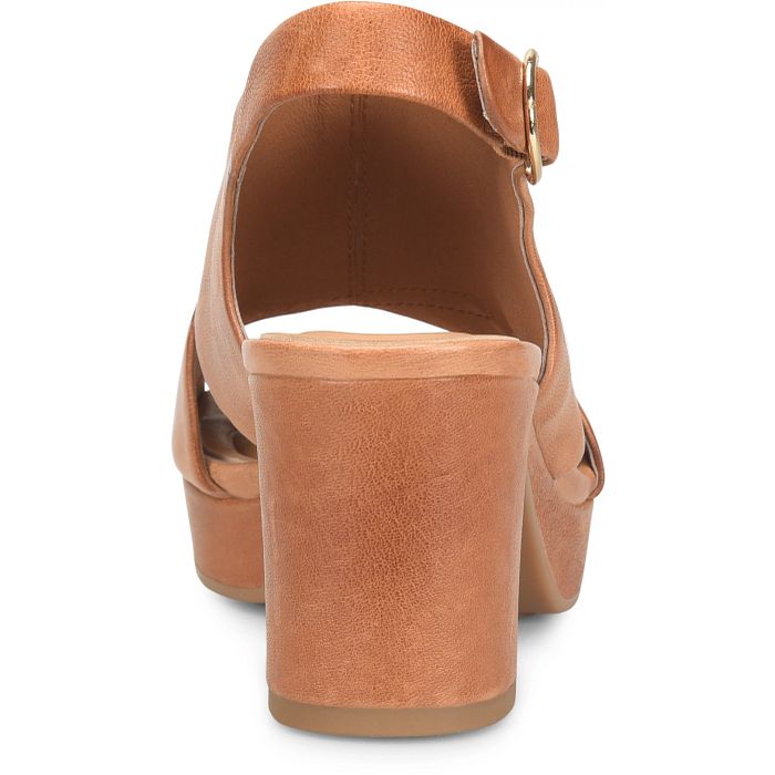 Brown wedge sandal on a white background