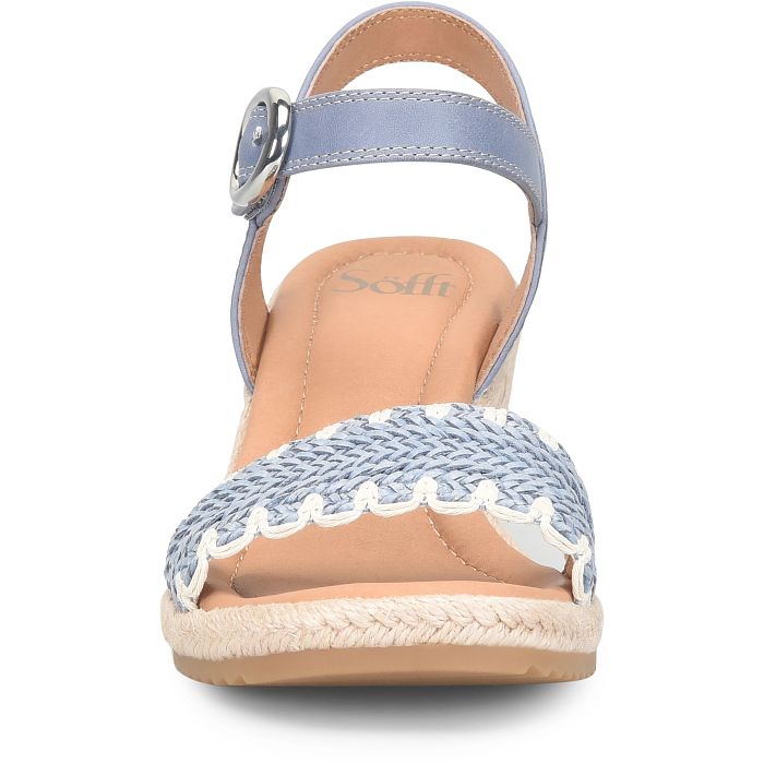 Light blue sandal with woven sole on a white background