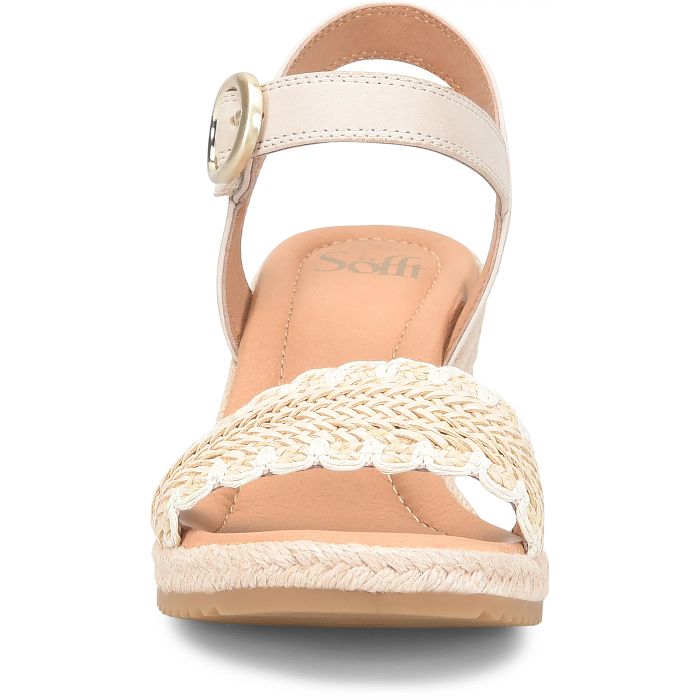 Beige sandal with woven sole on a white background