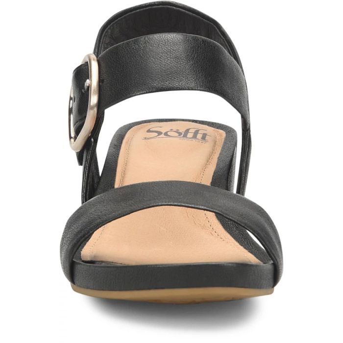 Black sandal with tan insole on a white background
