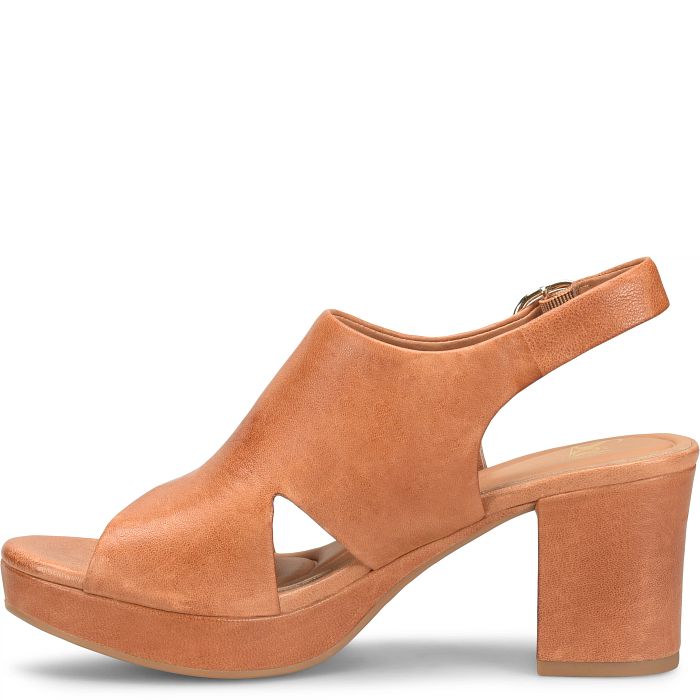 Tan sandal with a block heel on a white background