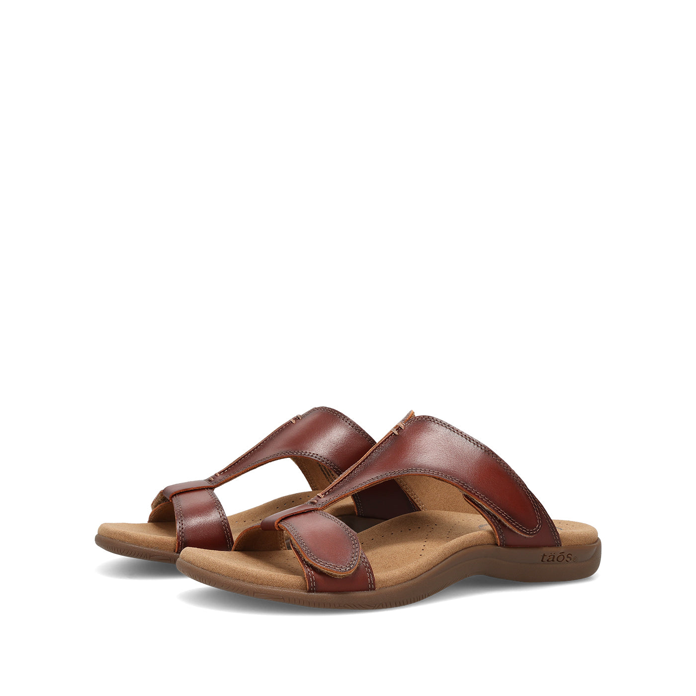Pair of brown sandals on a white background