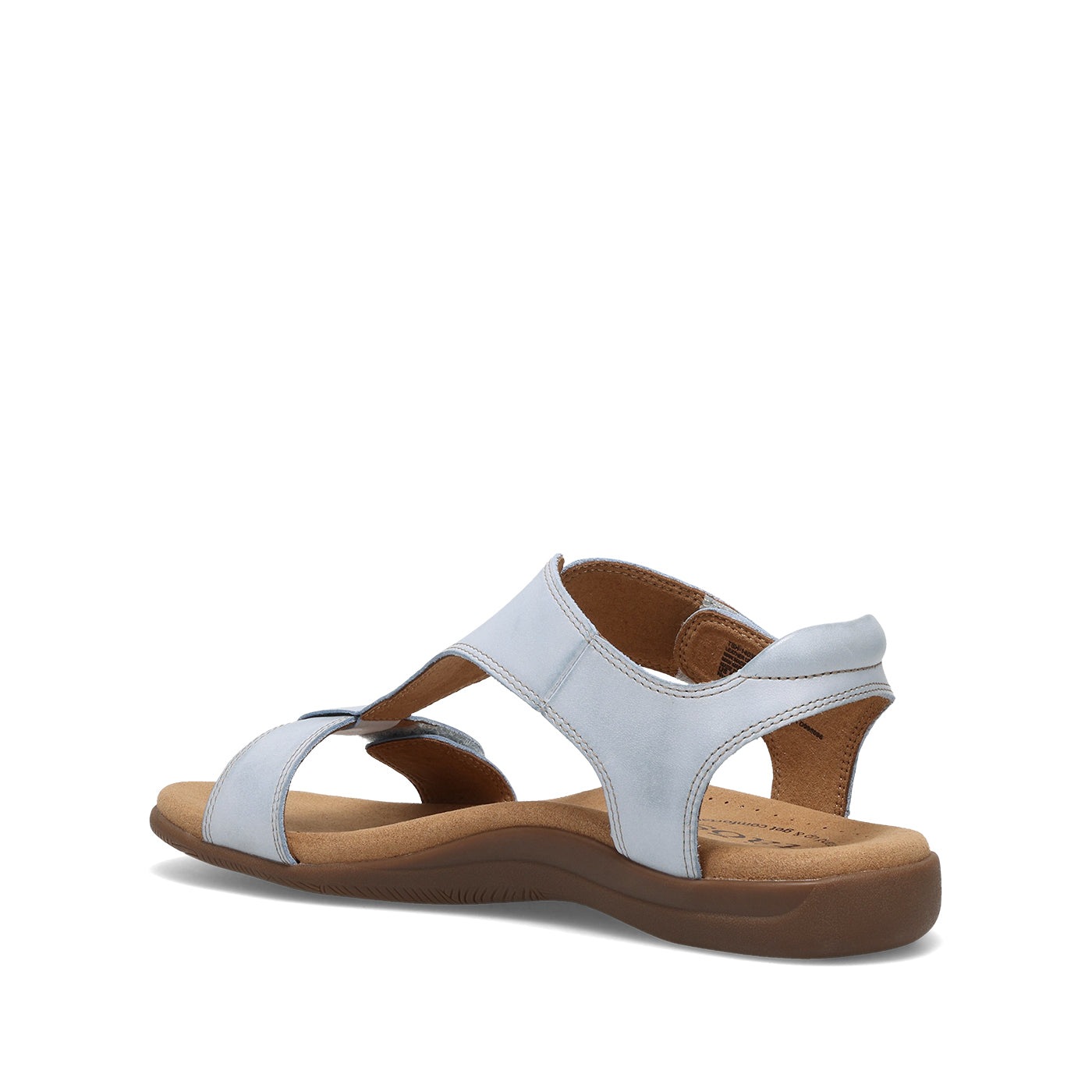 White sandal with brown sole on a white background