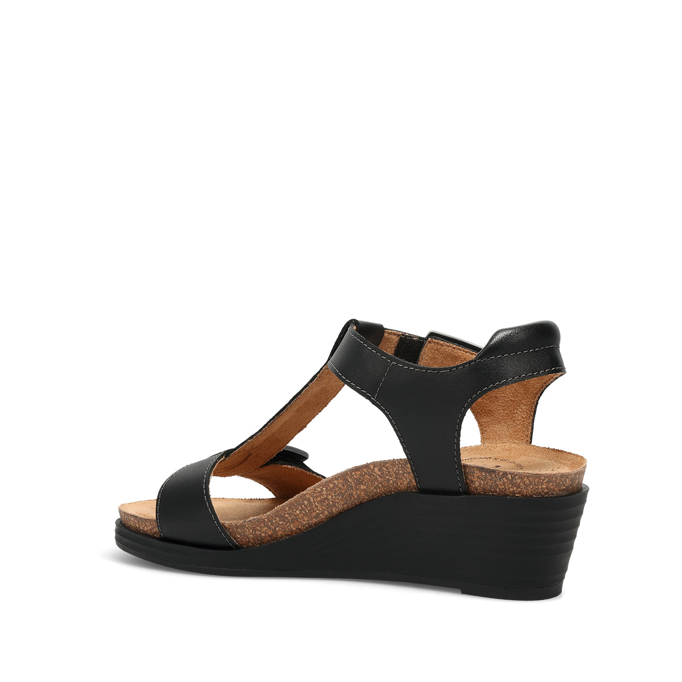 Black wedge sandal with cork insole on a white background