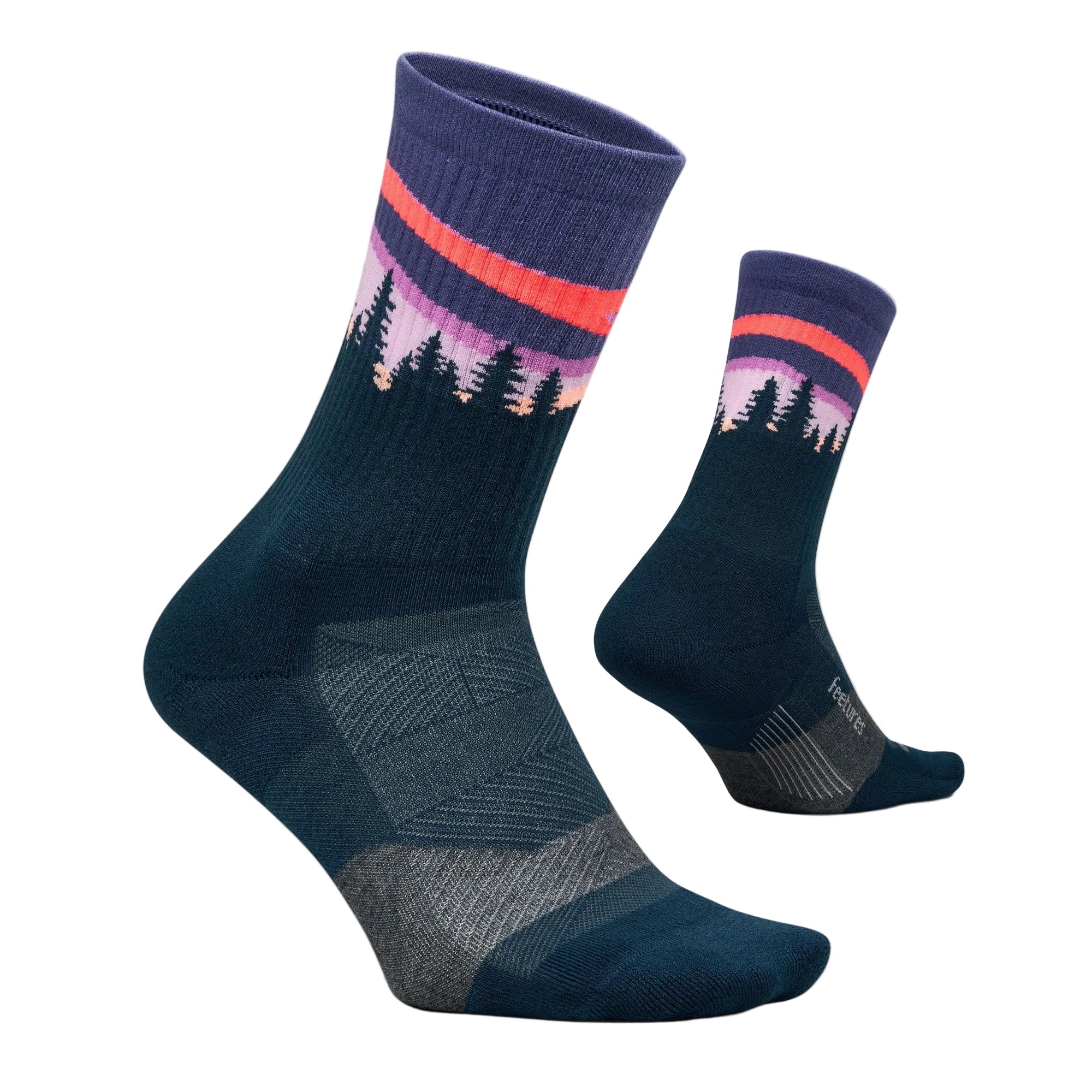 Pair of blue socks with a nature-themed design on a light gray background