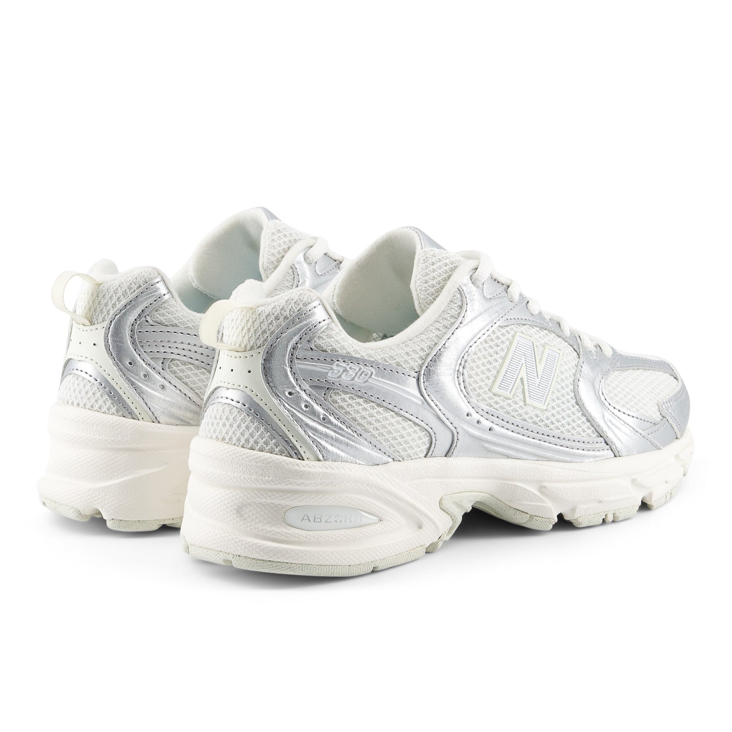 White sneakers with a brand logo on a white background