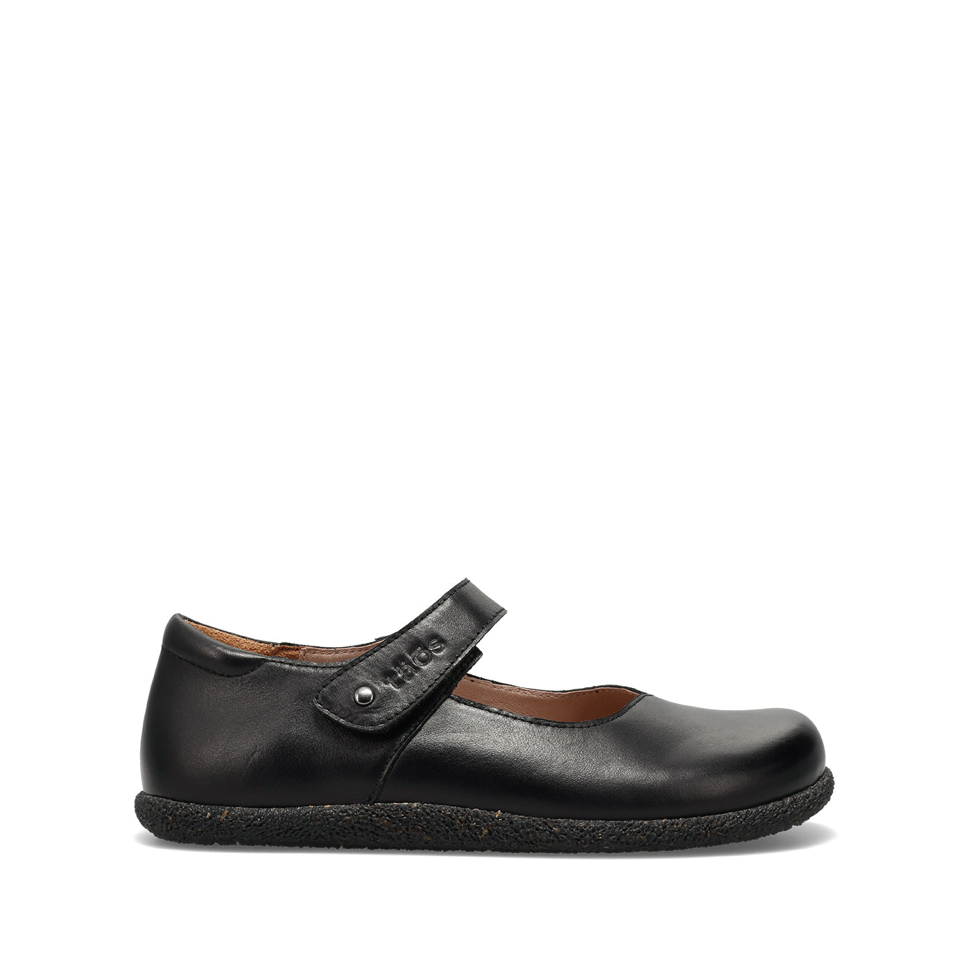 A single black leather Mary Jane shoe with a hook-and-loop strap and a silver metal rivet, shown in profile against a plain white background.