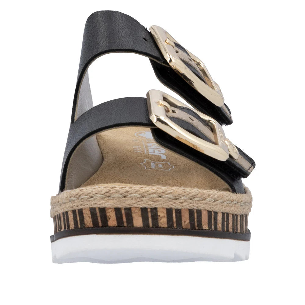Black wedge sandal with gold buckles on a white background